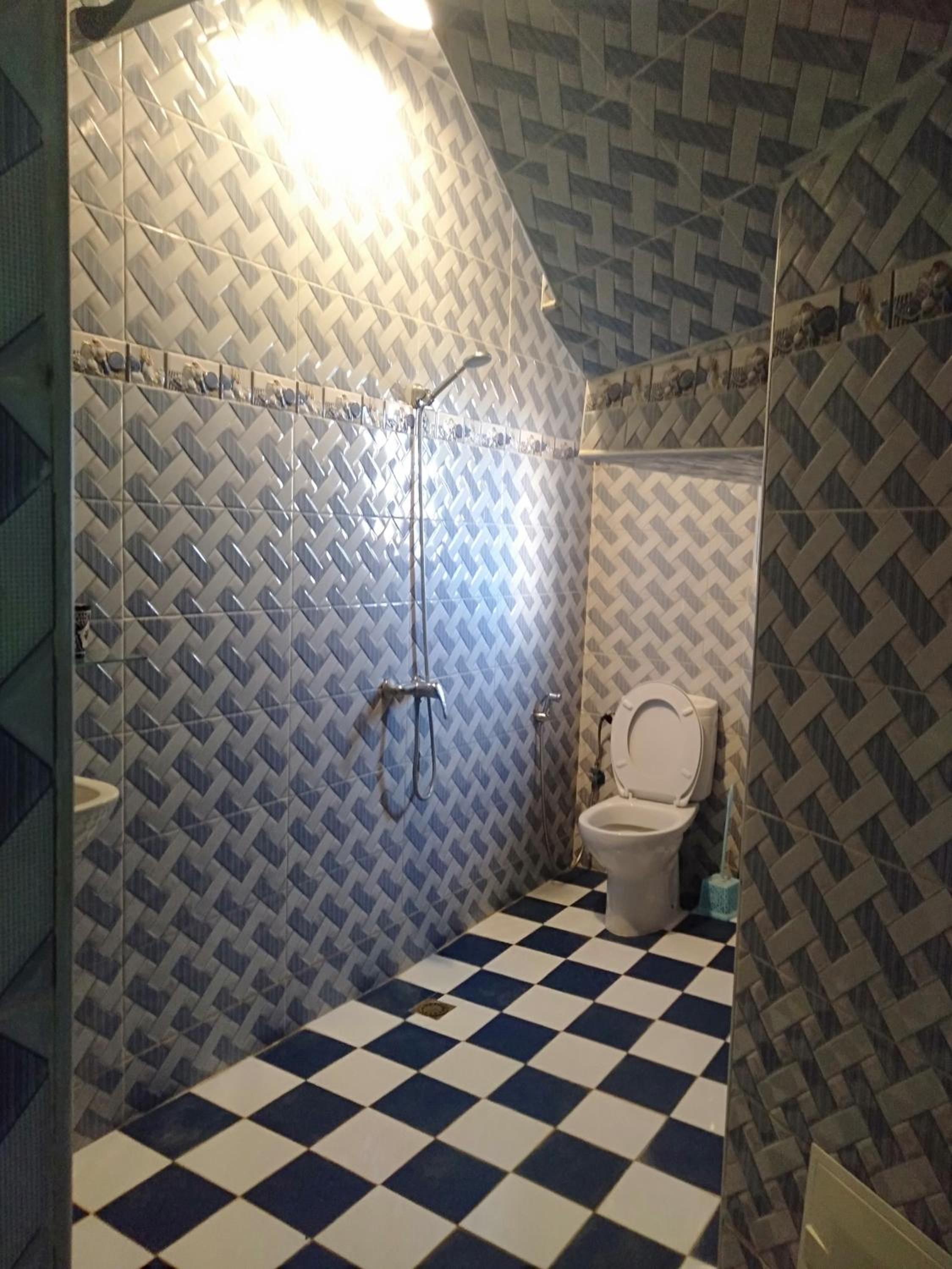 Three-Bedroom Apartment - Photo 14