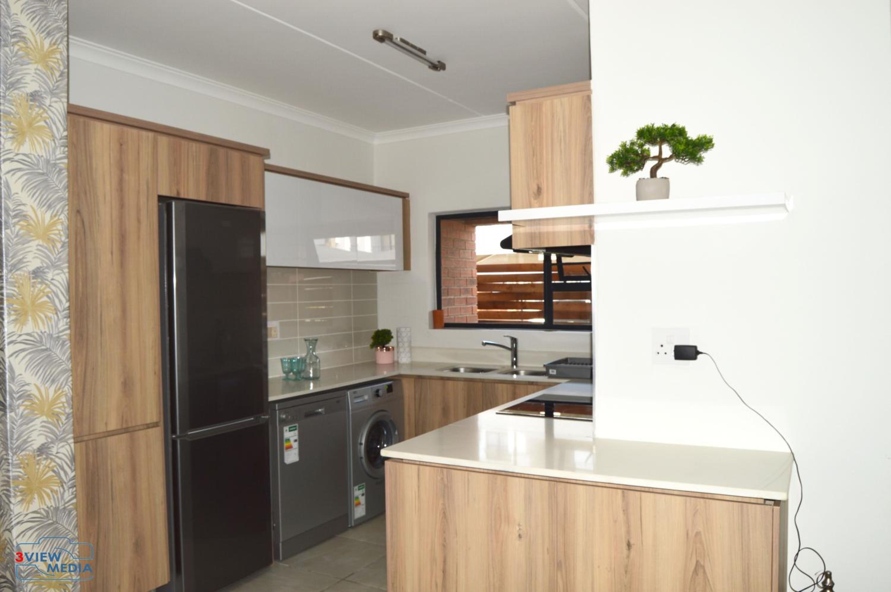 Three-Bedroom Apartment - Photo 11