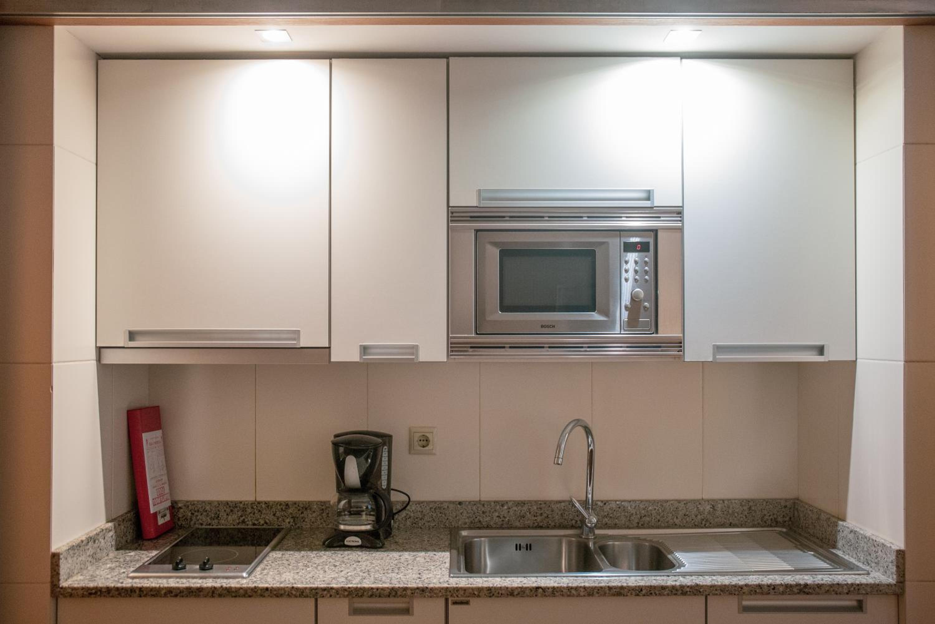 Three-Bedroom Apartment - Photo 2