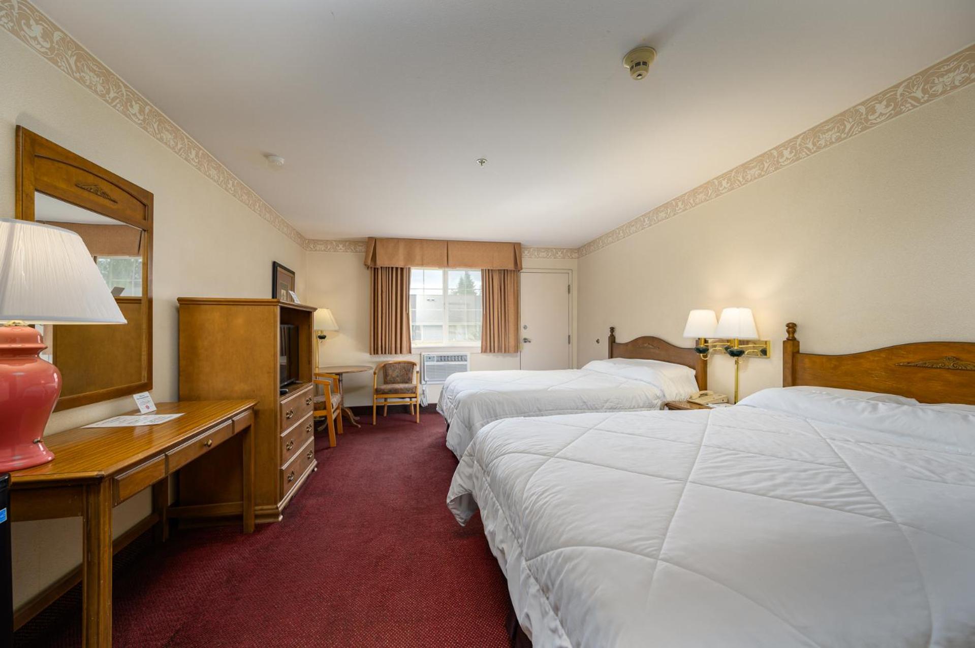 Queen Room with Two Queen Beds - Photo 1