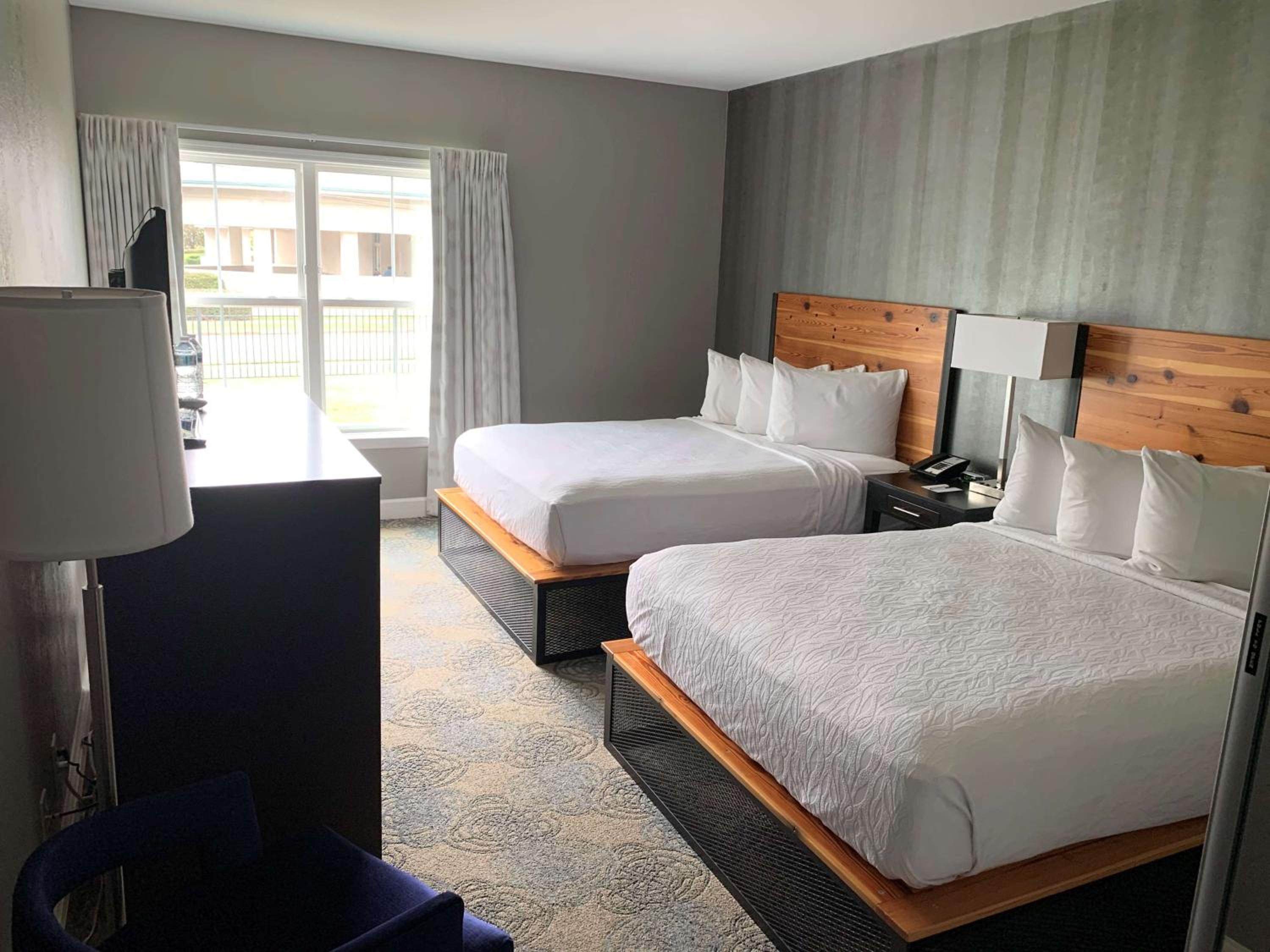 Queen Room with Two Queen Beds and Mobility Accessible Bathtub photo 1