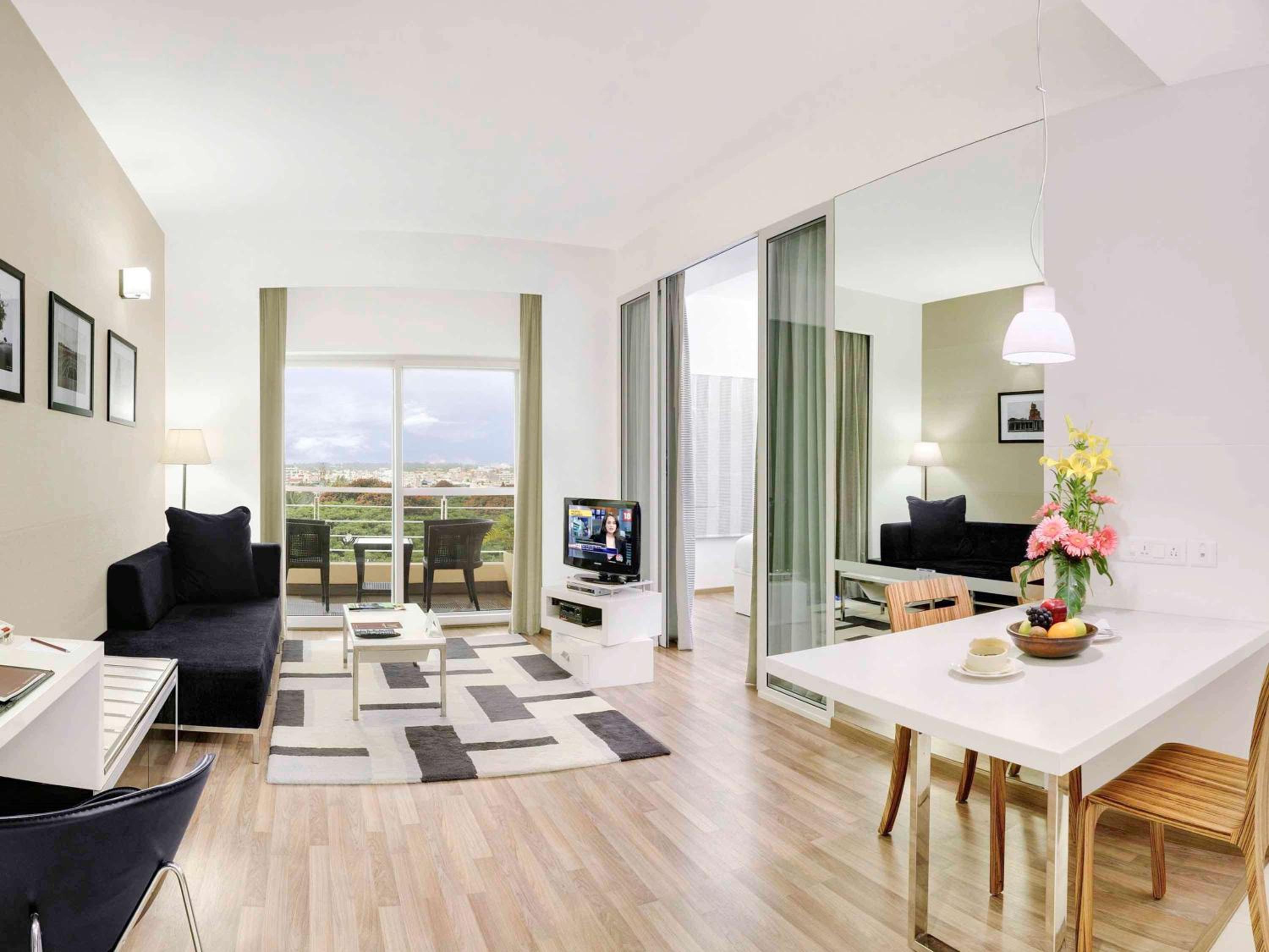 One-Bedroom Suite with Balcony with 20% discount on food and soft beverages and spa and Happy Hour 1+1 at By the Blue - Photo 1