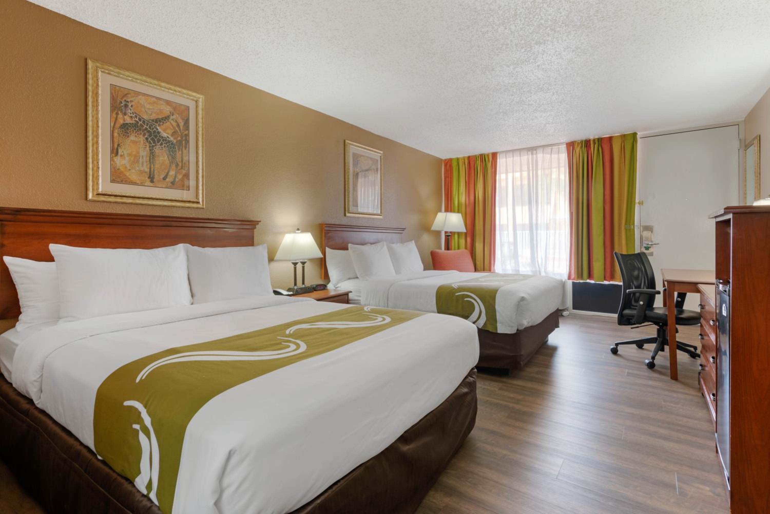 Queen Room with Two Queen Beds - Non-Smoking - Photo 1