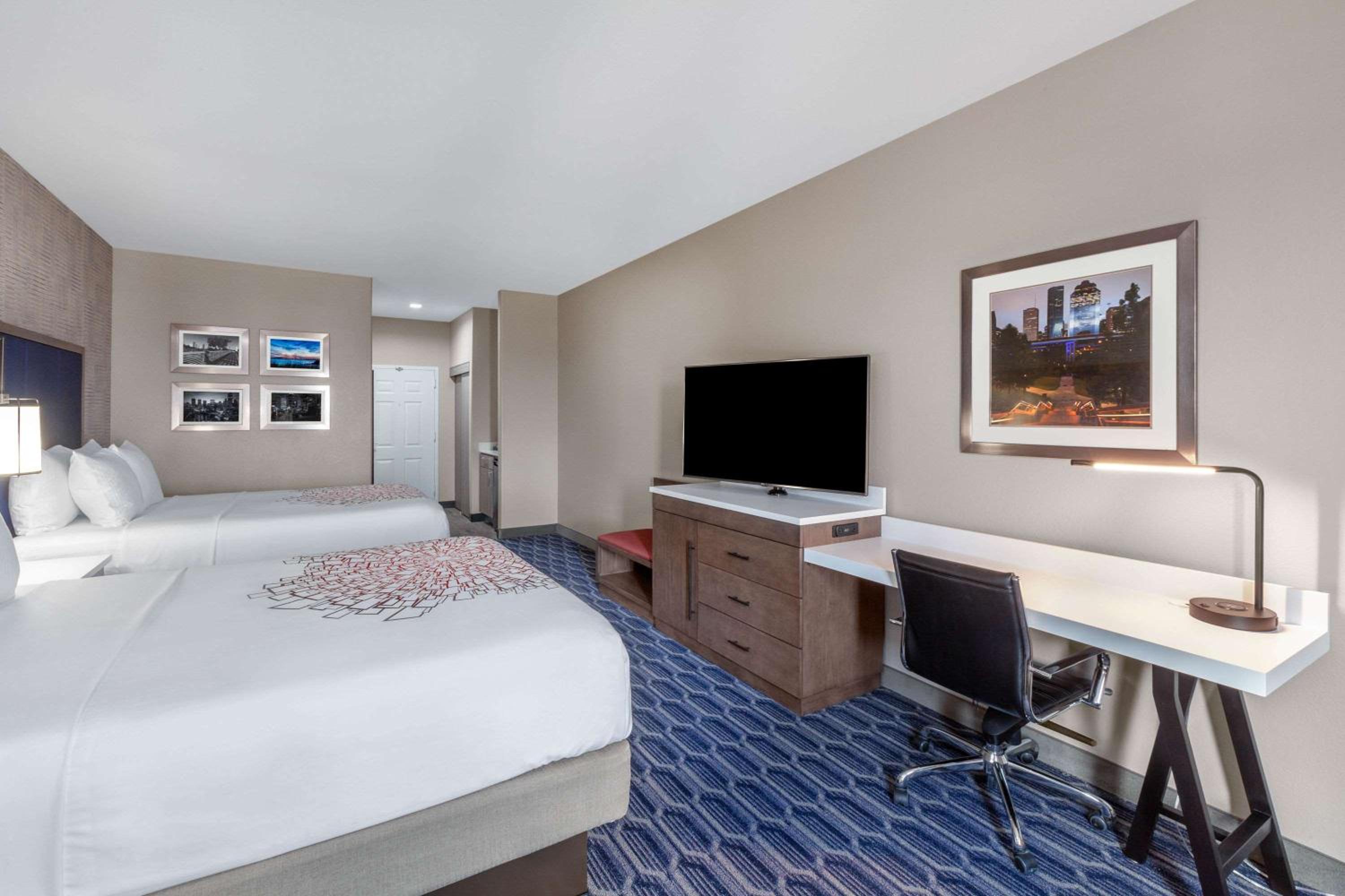Standard Queen Room with Two Queen Beds - Photo 1