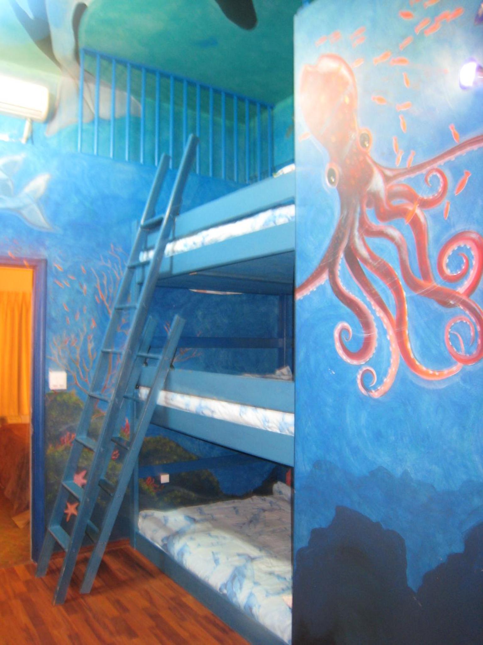 Queen Suite with Three Bunk Beds - Photo 1