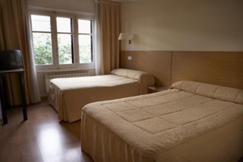 Habitación Doble Estándar o con Dos Camas Individuales.