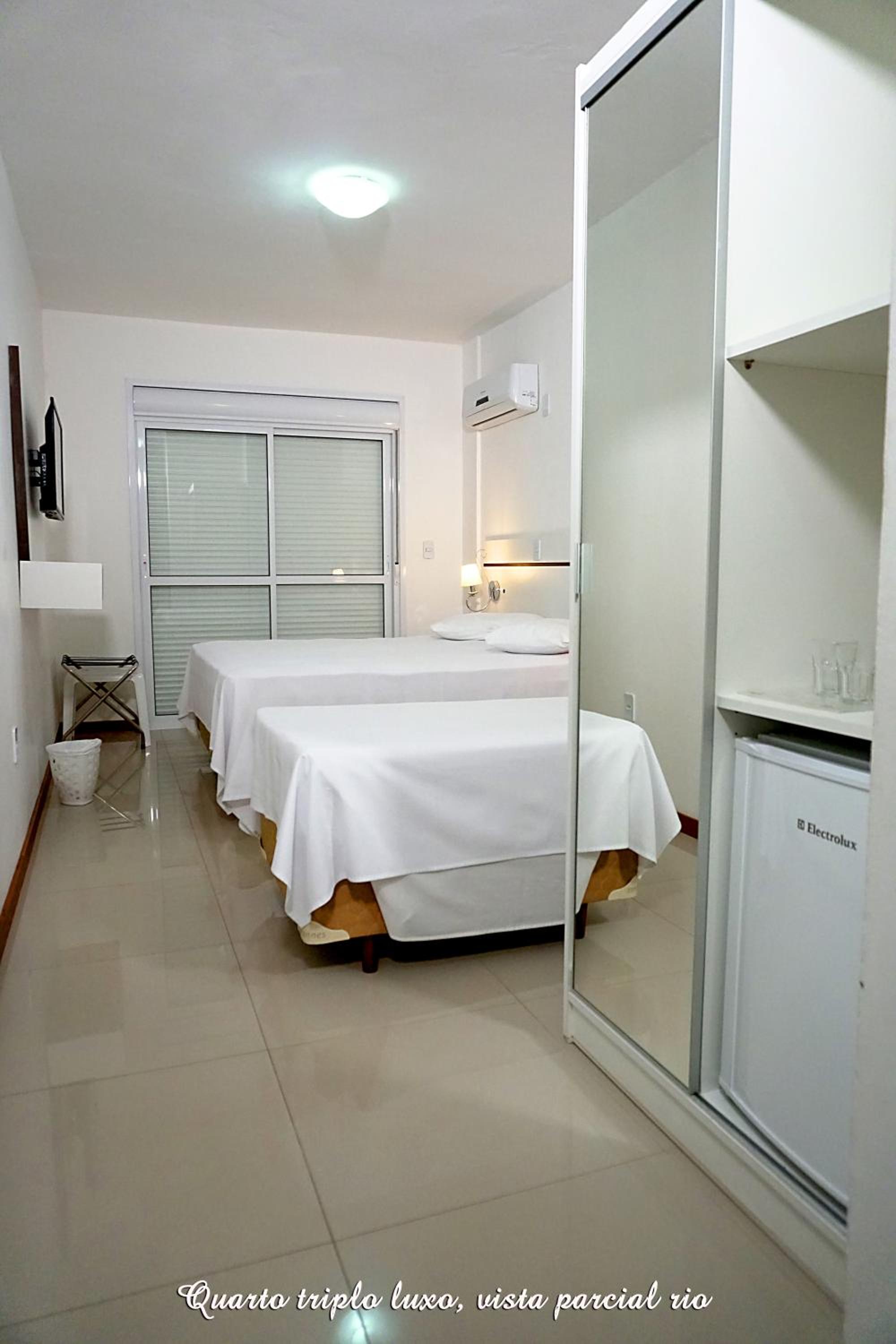 Triple Room with Partial River View photo 1