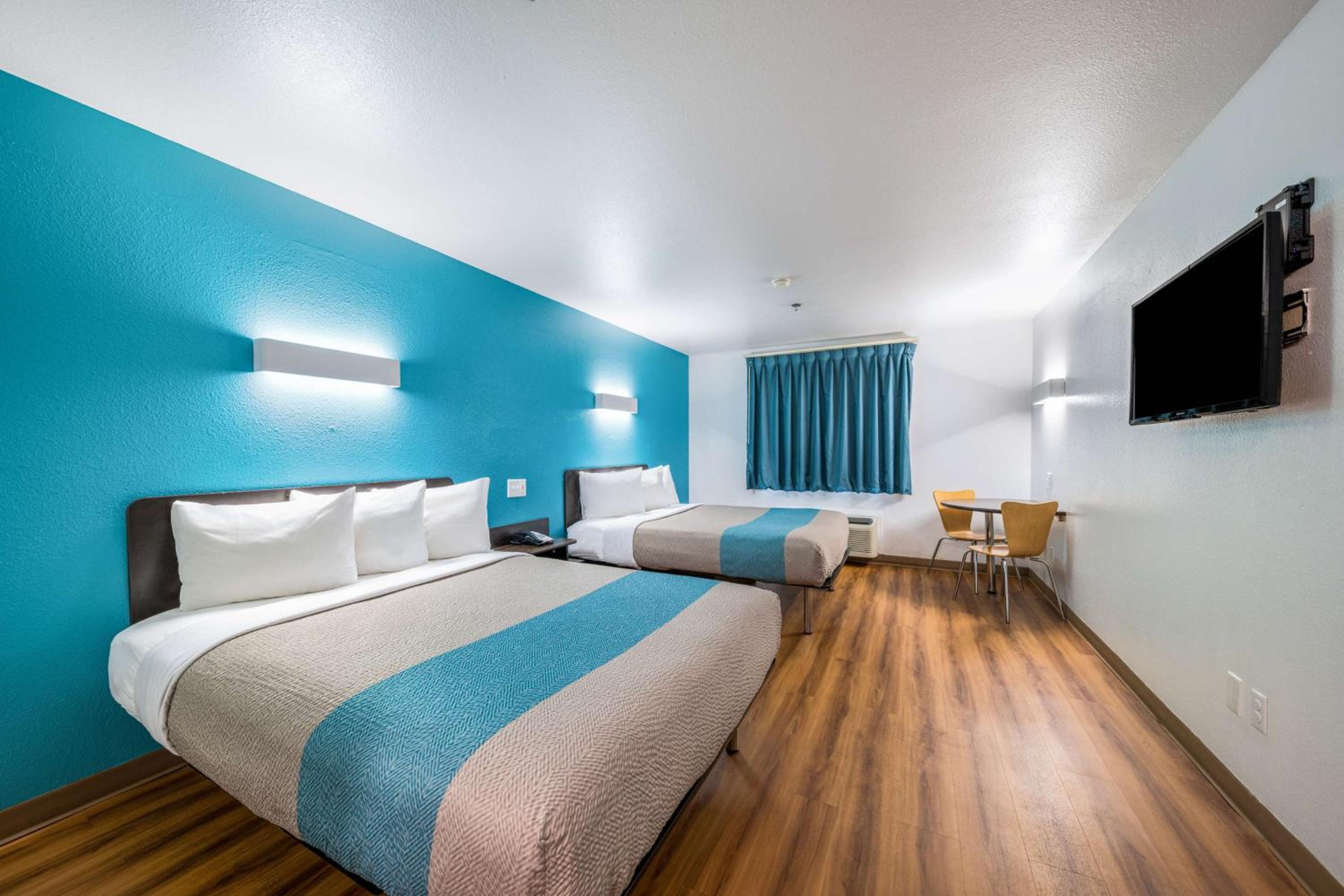 King Room with Two King Beds and Kitchen - Non-Smoking