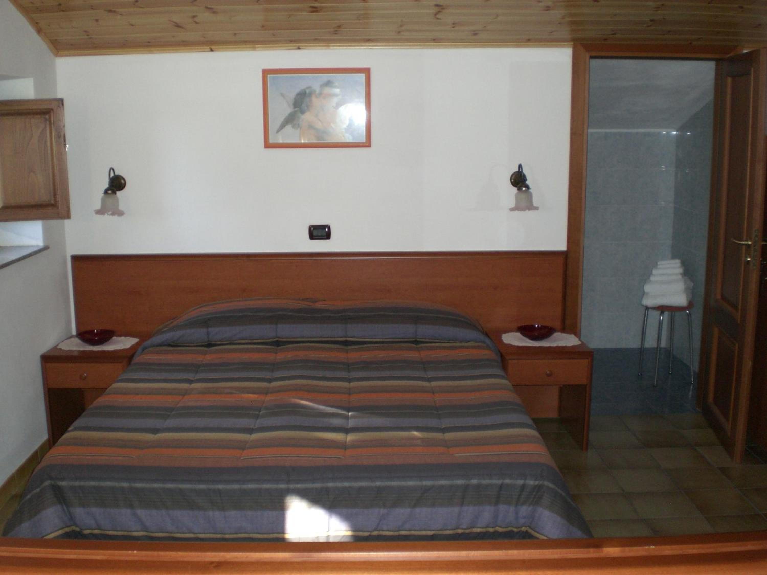 Quadruple Room with Balcony - Photo 10
