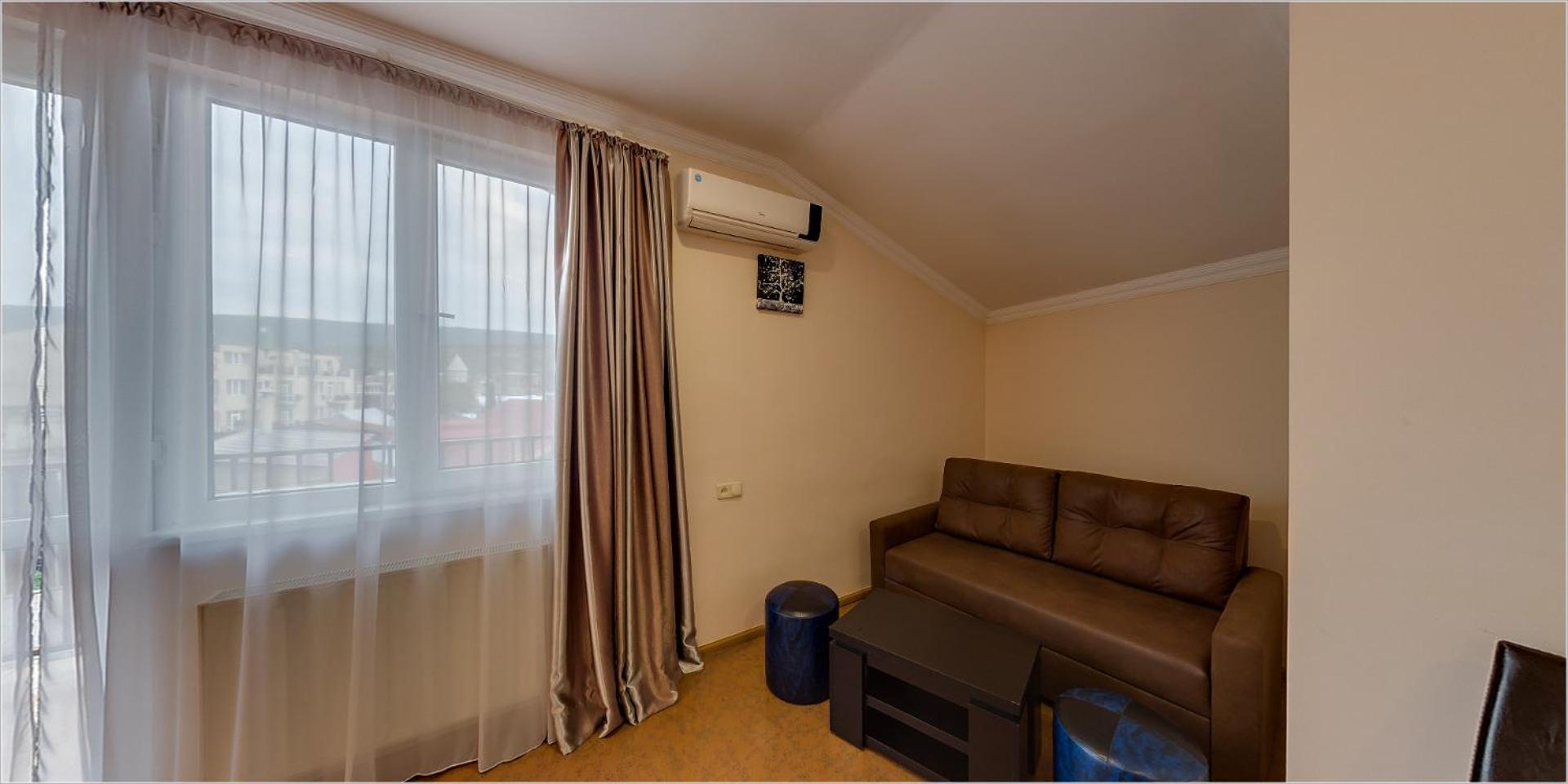 King Suite with Balcony - Photo 1