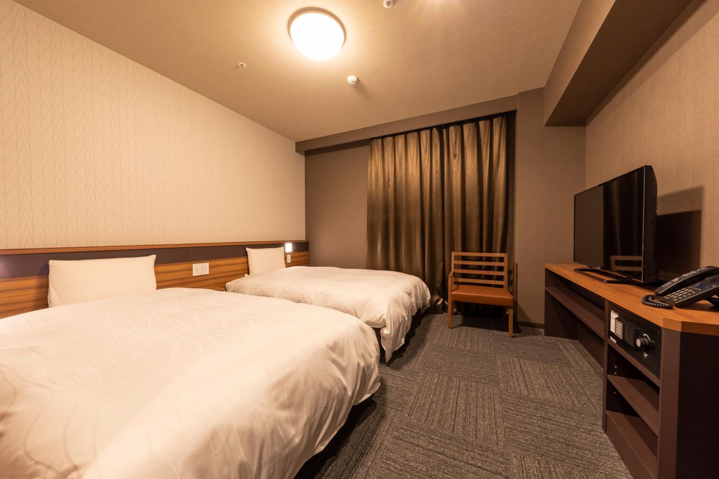 Twin Room - Non-Smoking - Photo 1