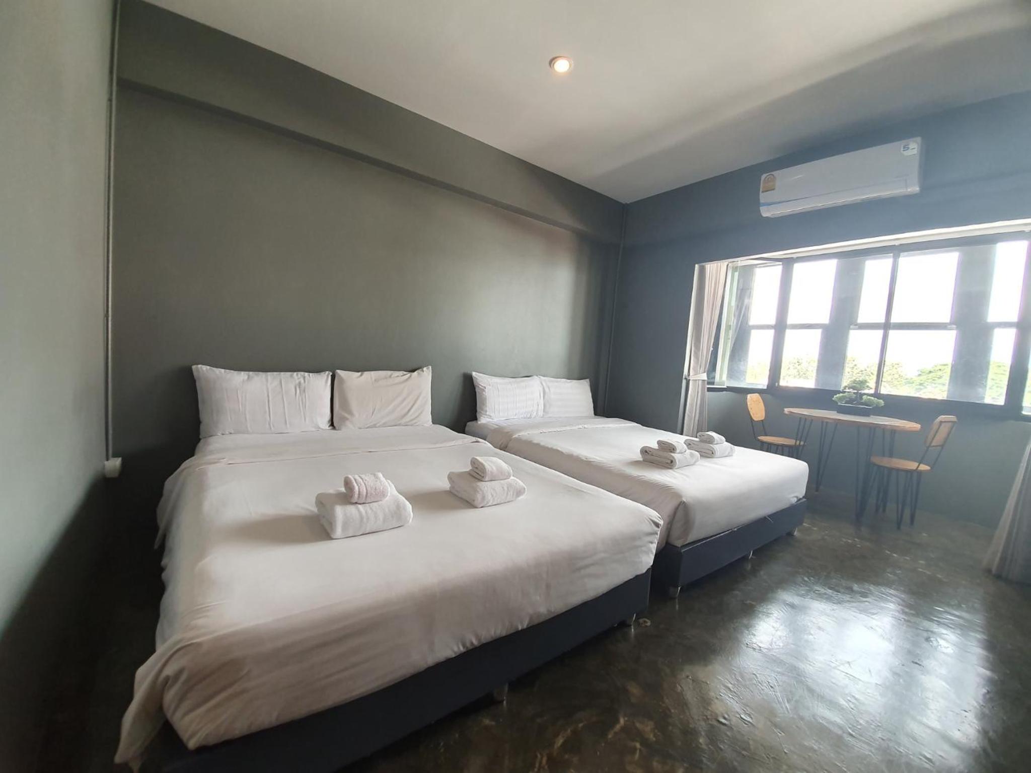 Deluxe Quadruple Room - Photo 12