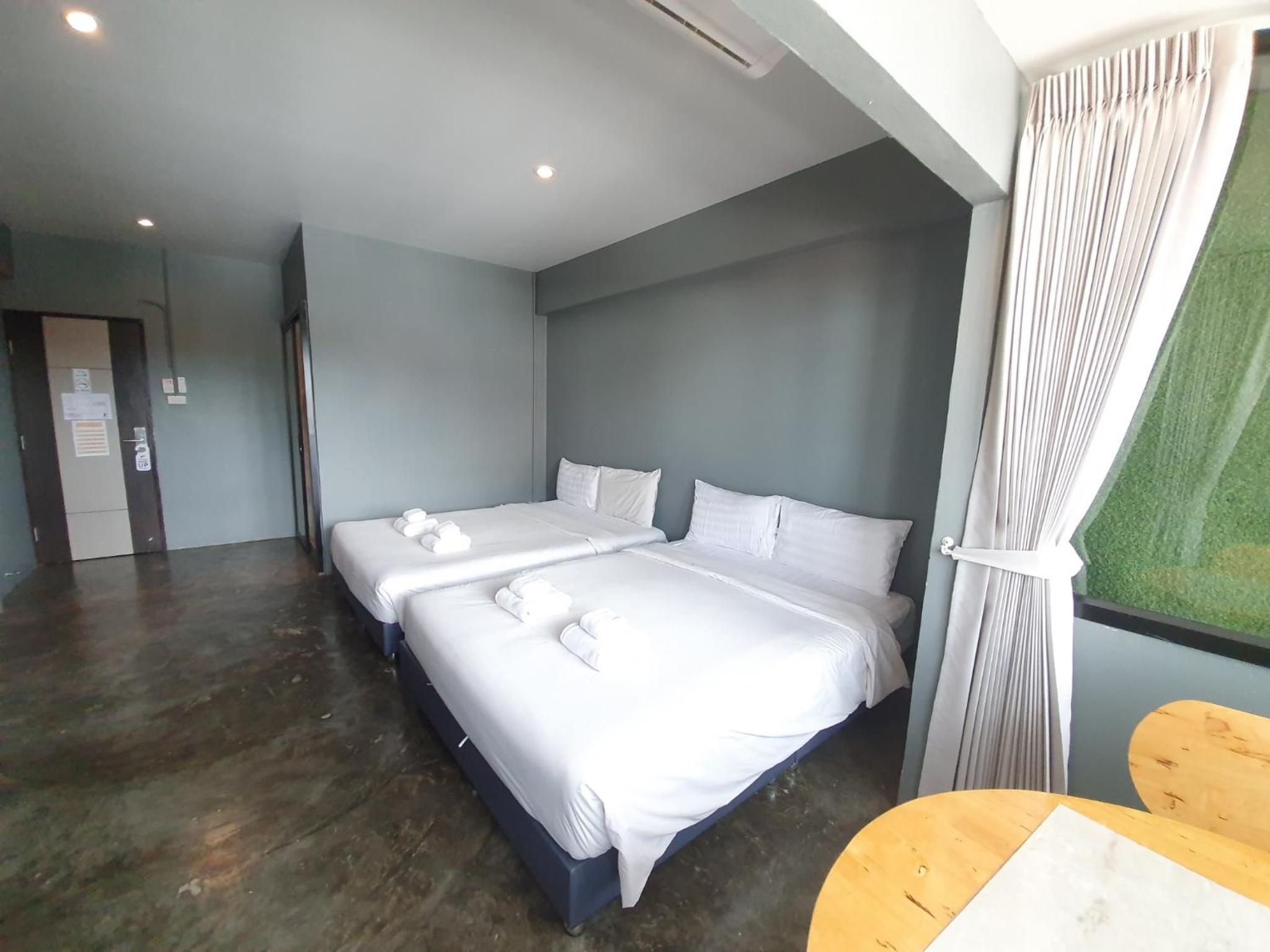 Deluxe Quadruple Room - Photo 4