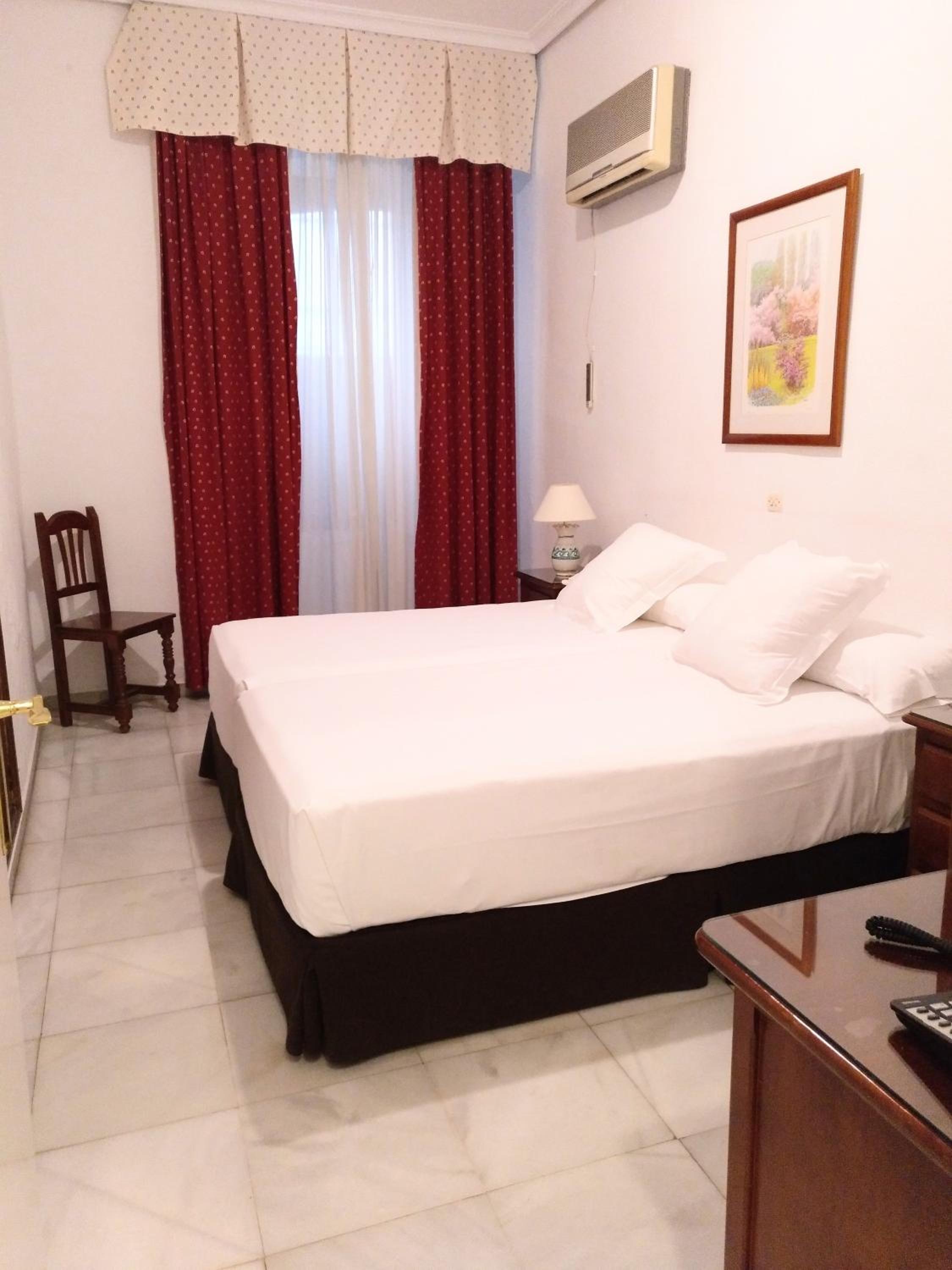 Habitación doble con dos camas en planta baja