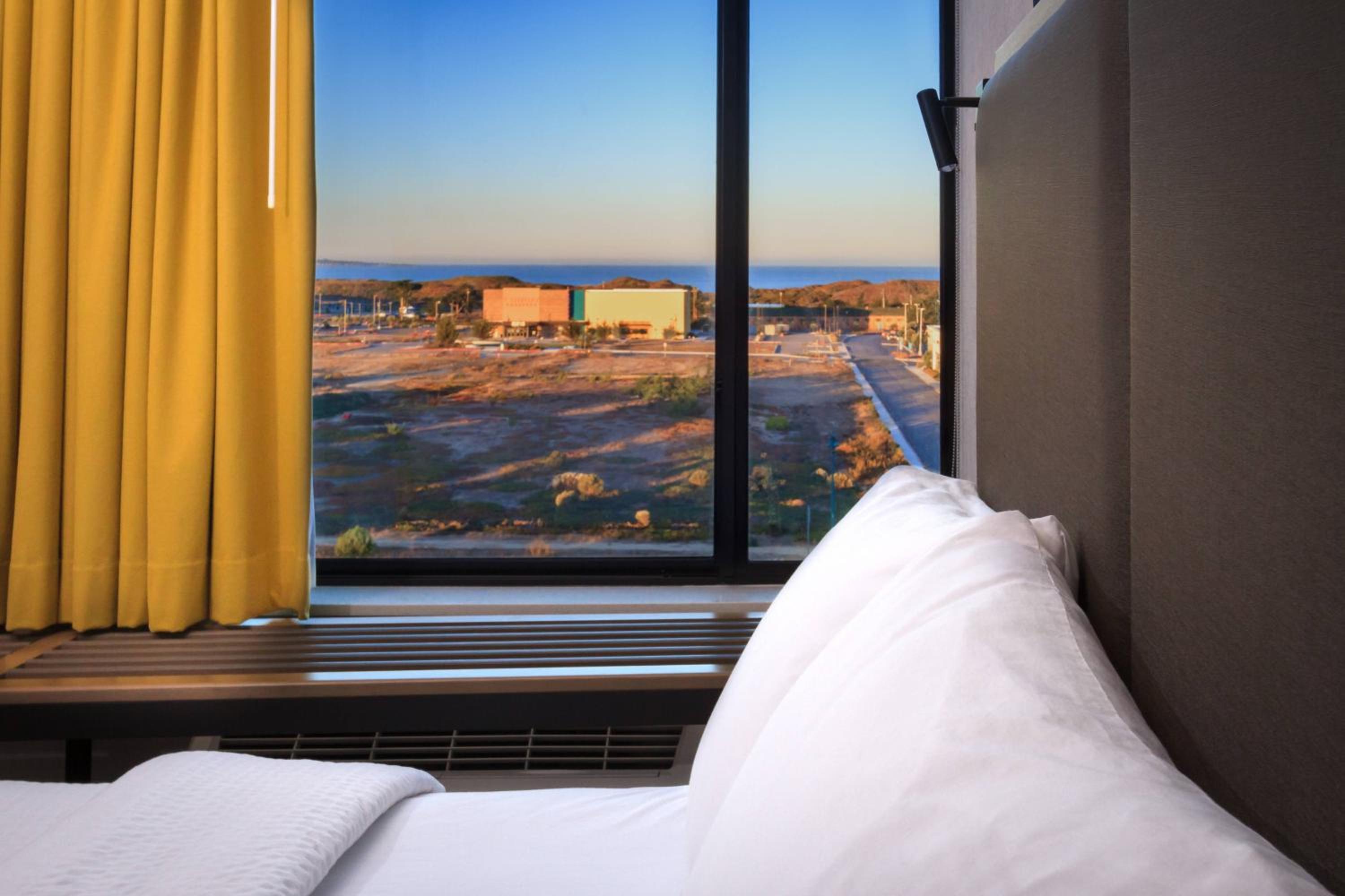 Queen Suite with Two Queen Beds, Ocean View, Trundle Sofa and Roll-In Shower - Mobility Access/Hearing Accessible