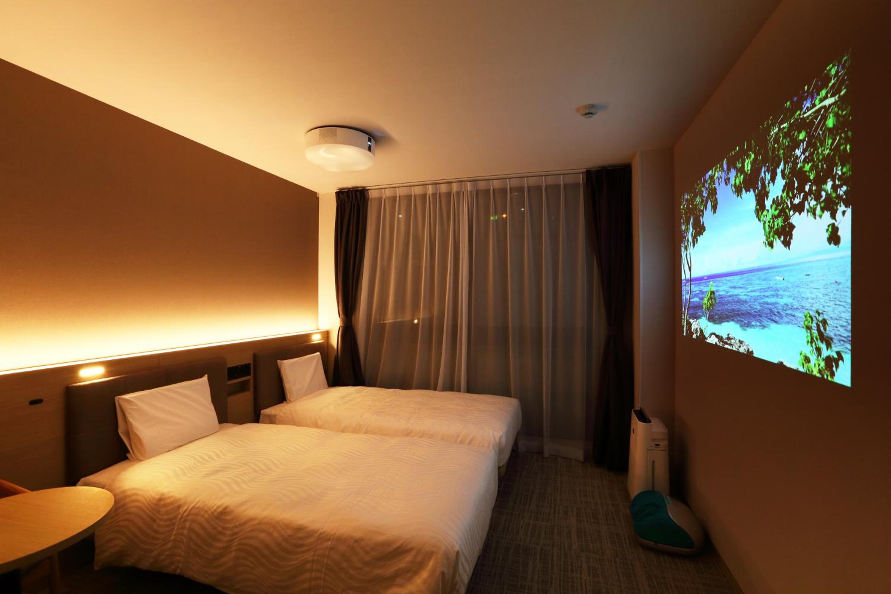 Triple Room with 2 Single Beds and 1 Sofa Bed - Photo 15