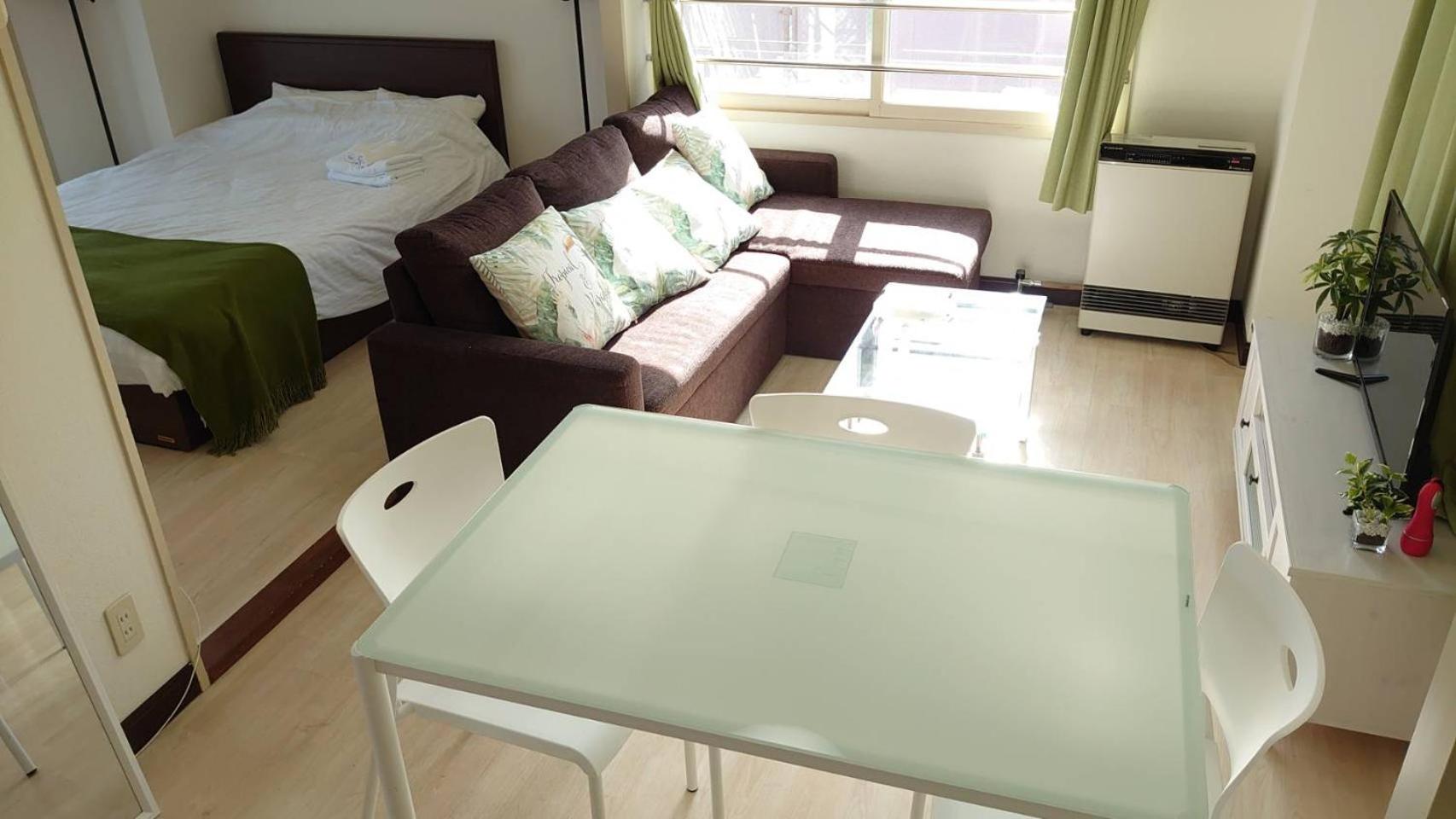 Three-Bedroom Apartment - Photo 11