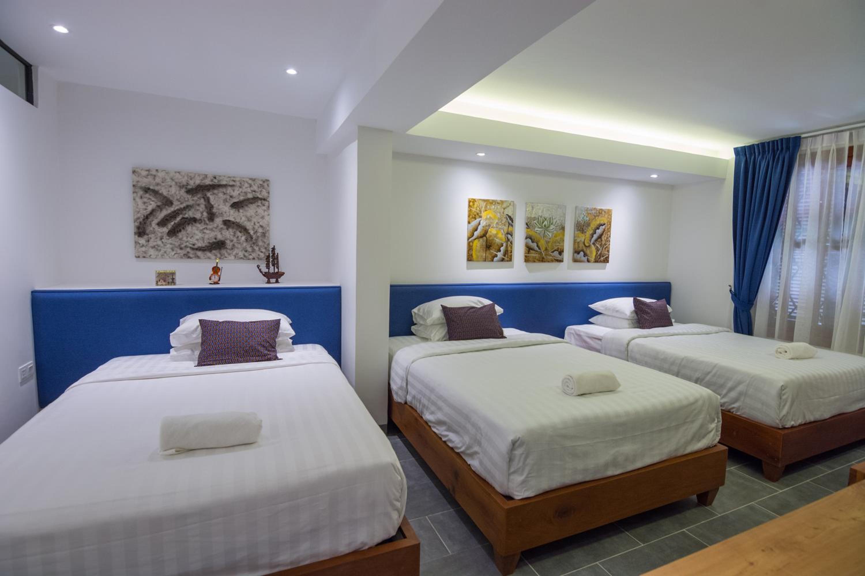 Deluxe Triple Room - Photo 6