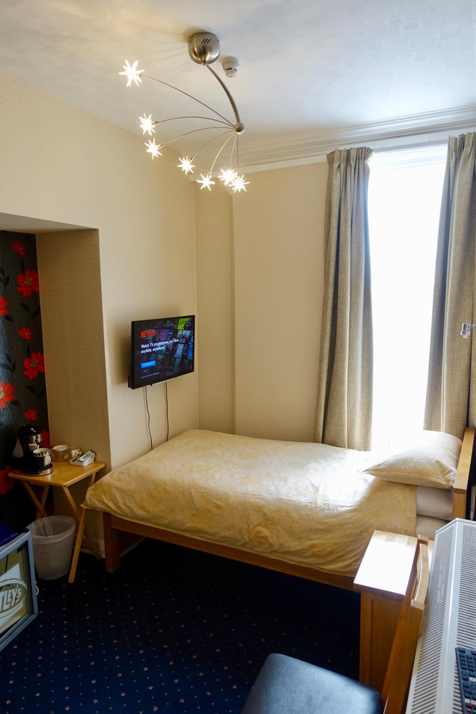 Single Room with Shared Shower and Toilet