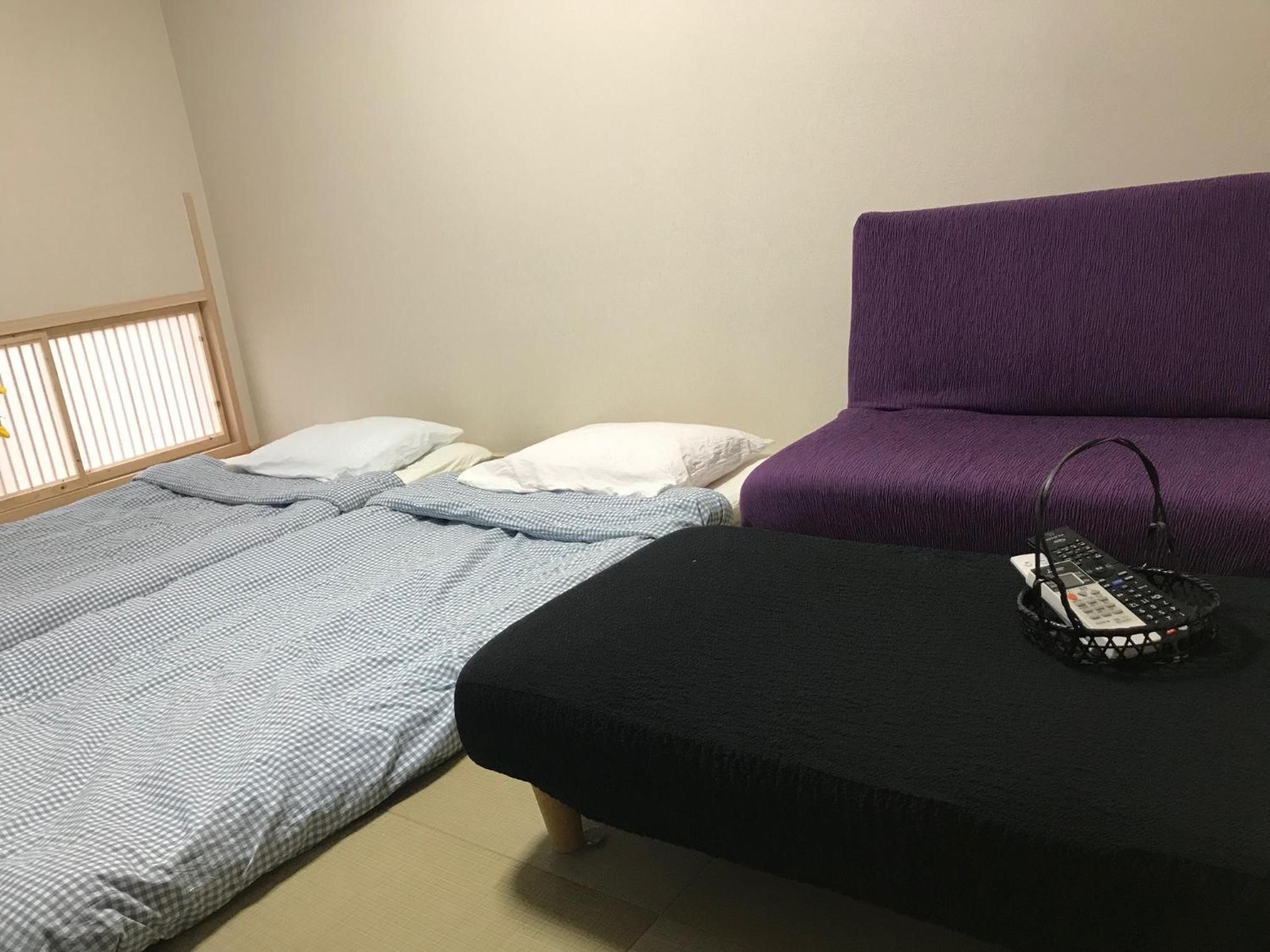 Economy Quadruple Room - Photo 1