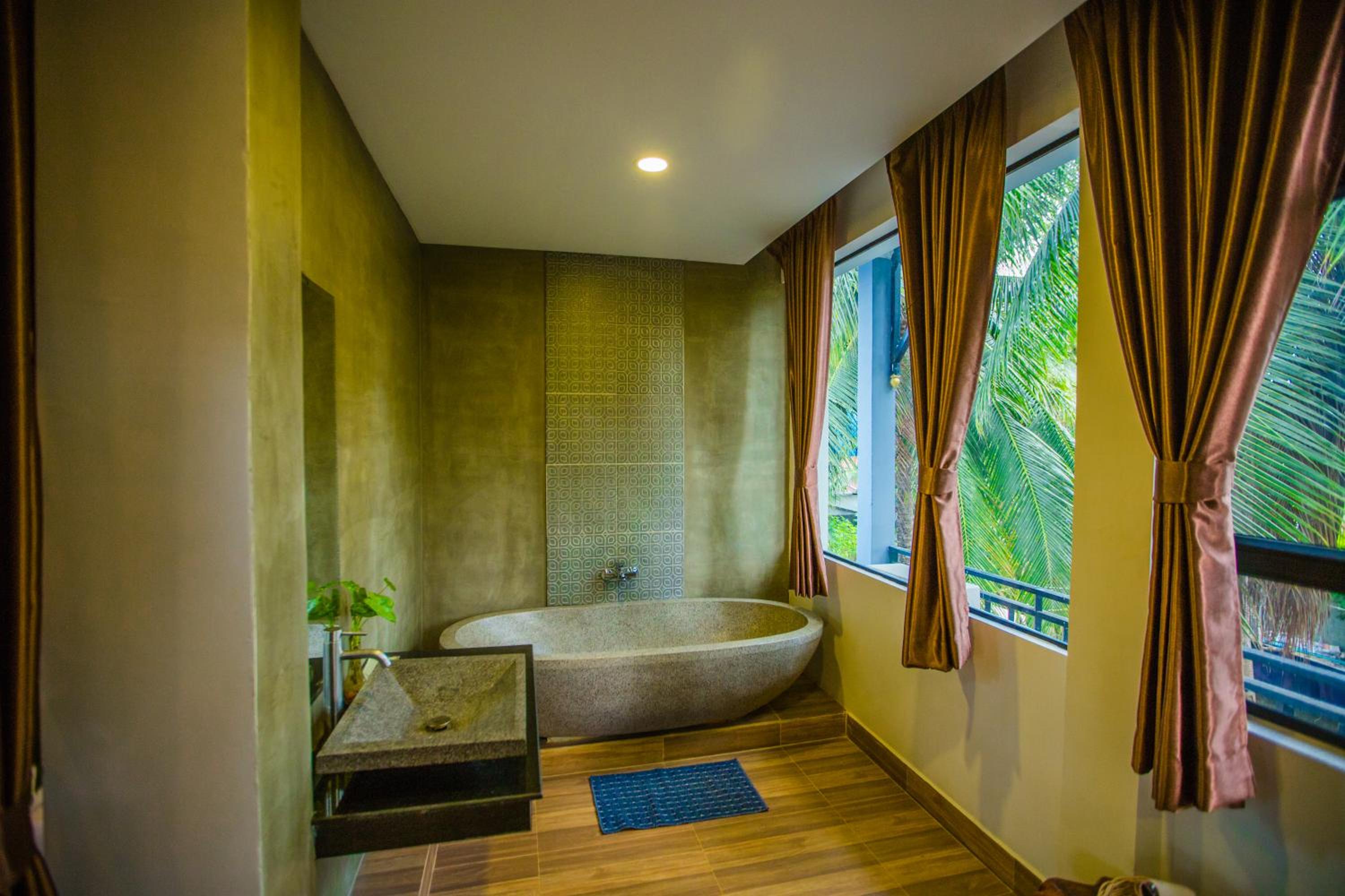 Deluxe Twin Room with Terrace Pool View - Photo 9