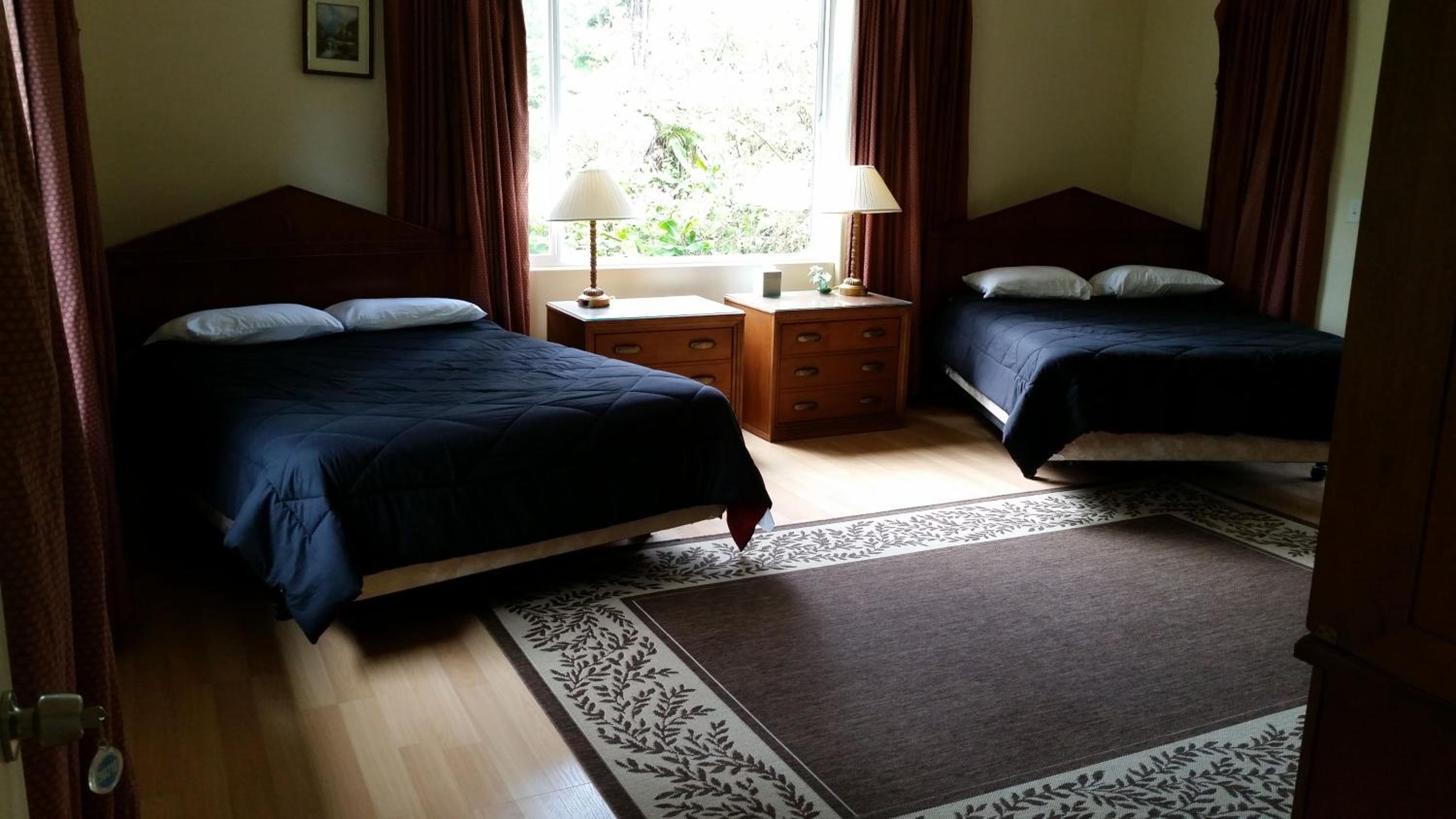 Deluxe Queen Room with Two Queen Beds - Photo 1