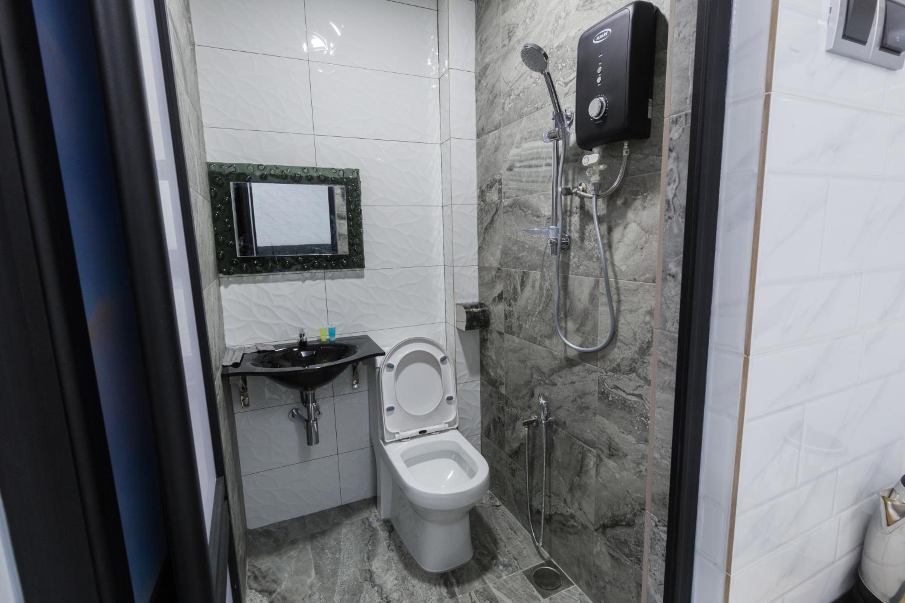 Deluxe Quadruple Room - Photo 7