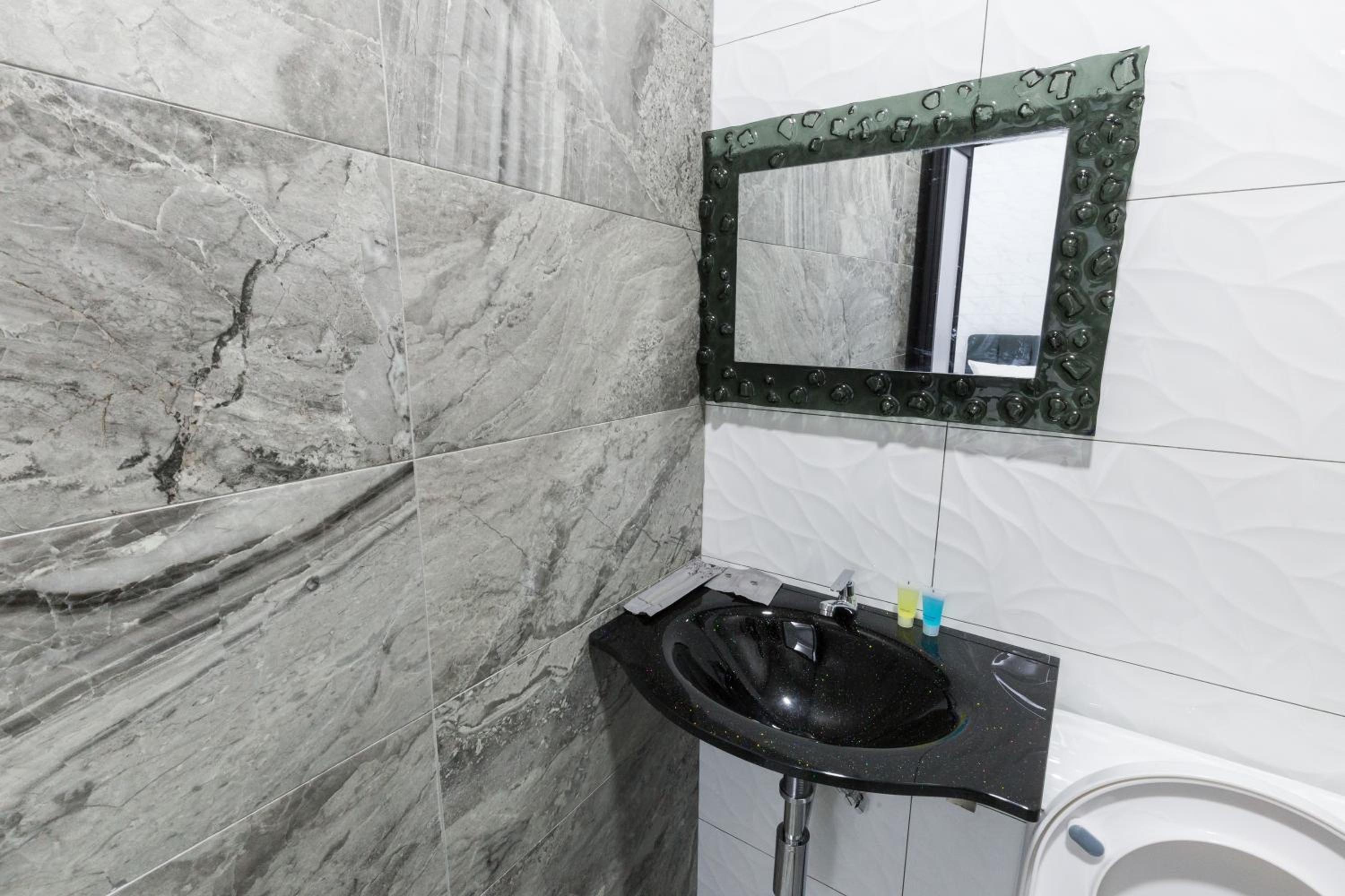 Deluxe Quadruple Room - Photo 6
