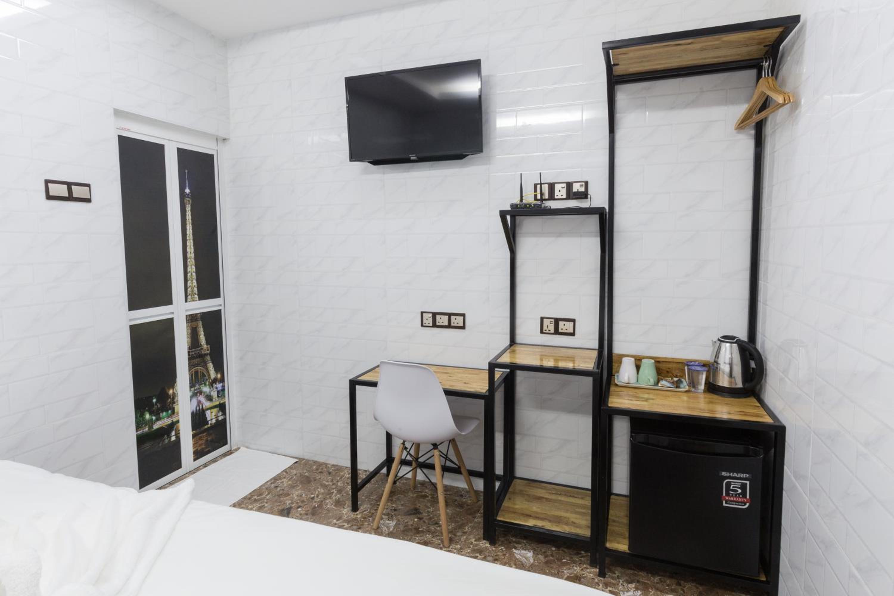 Deluxe Triple Room - Photo 10