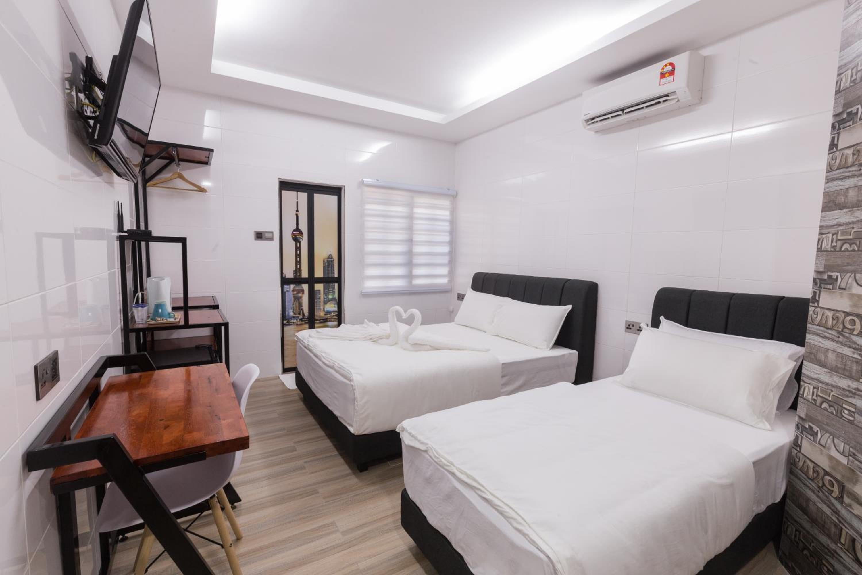 Deluxe Triple Room - Photo 1
