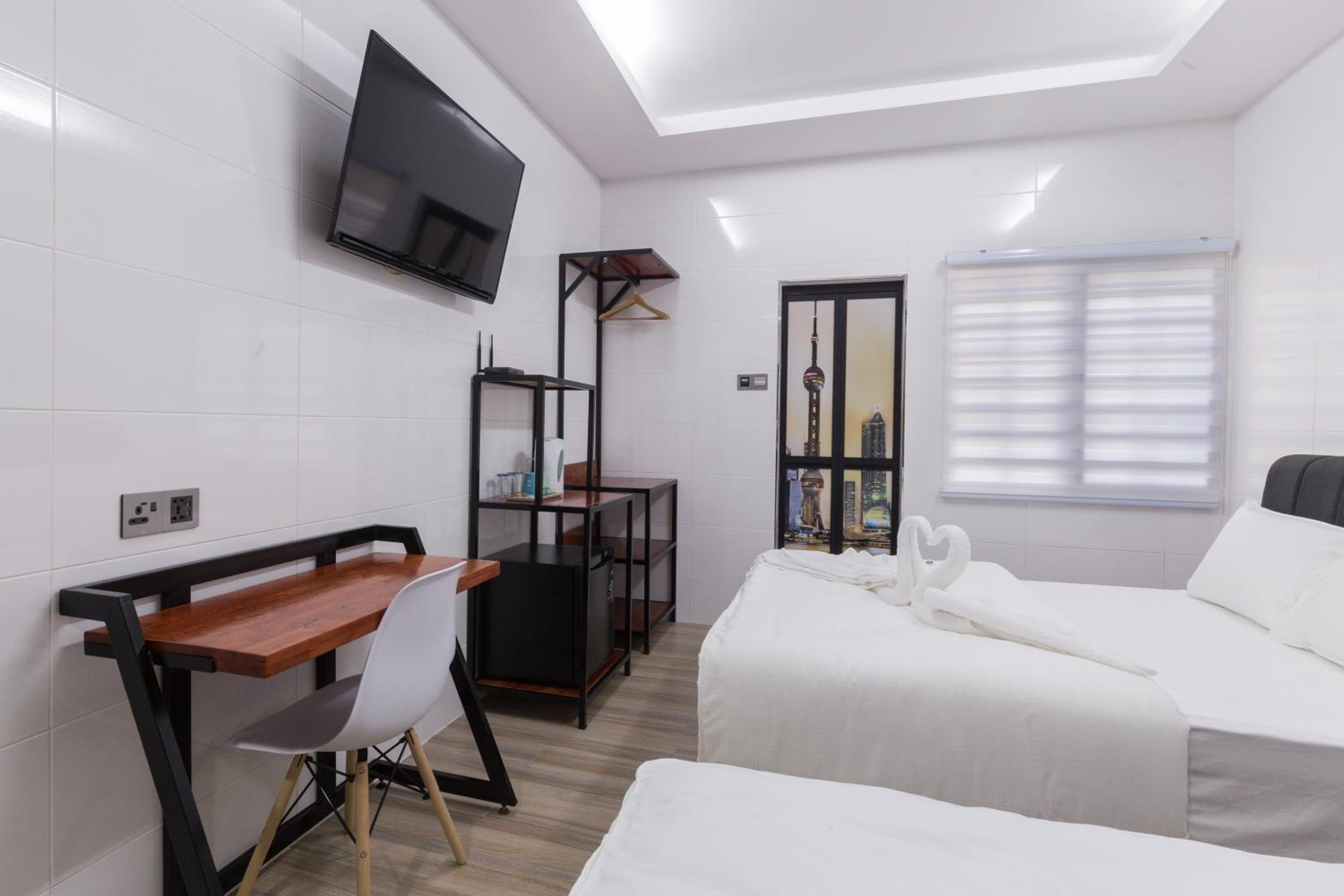 Deluxe Triple Room - Photo 2