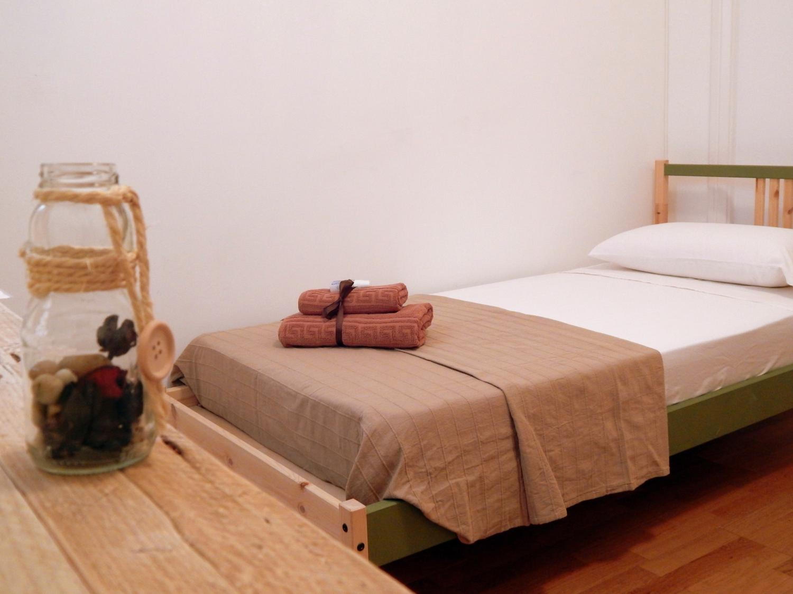 Habitación individual con baño compartido