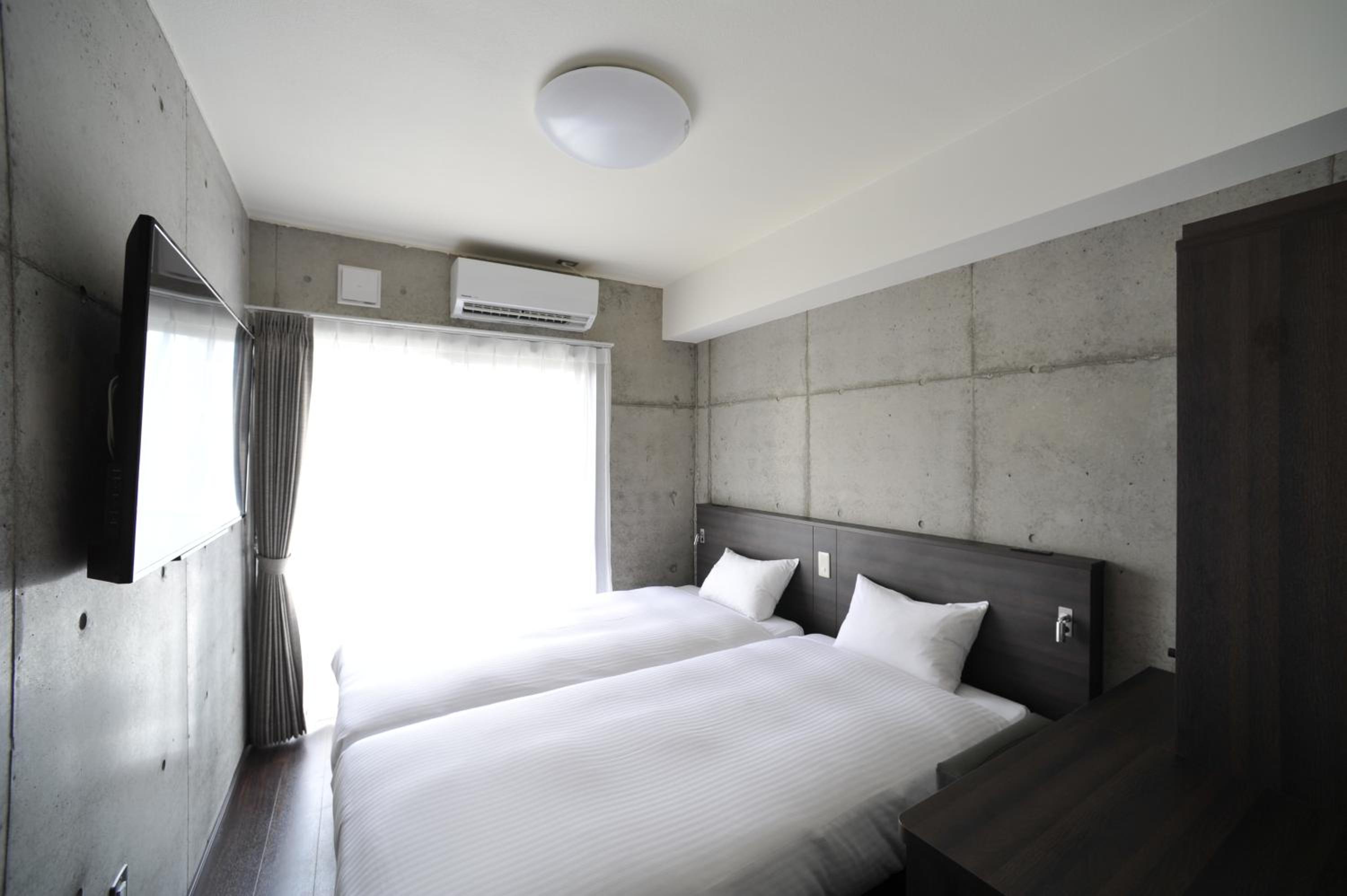 Twin Room in Hotel Bldg