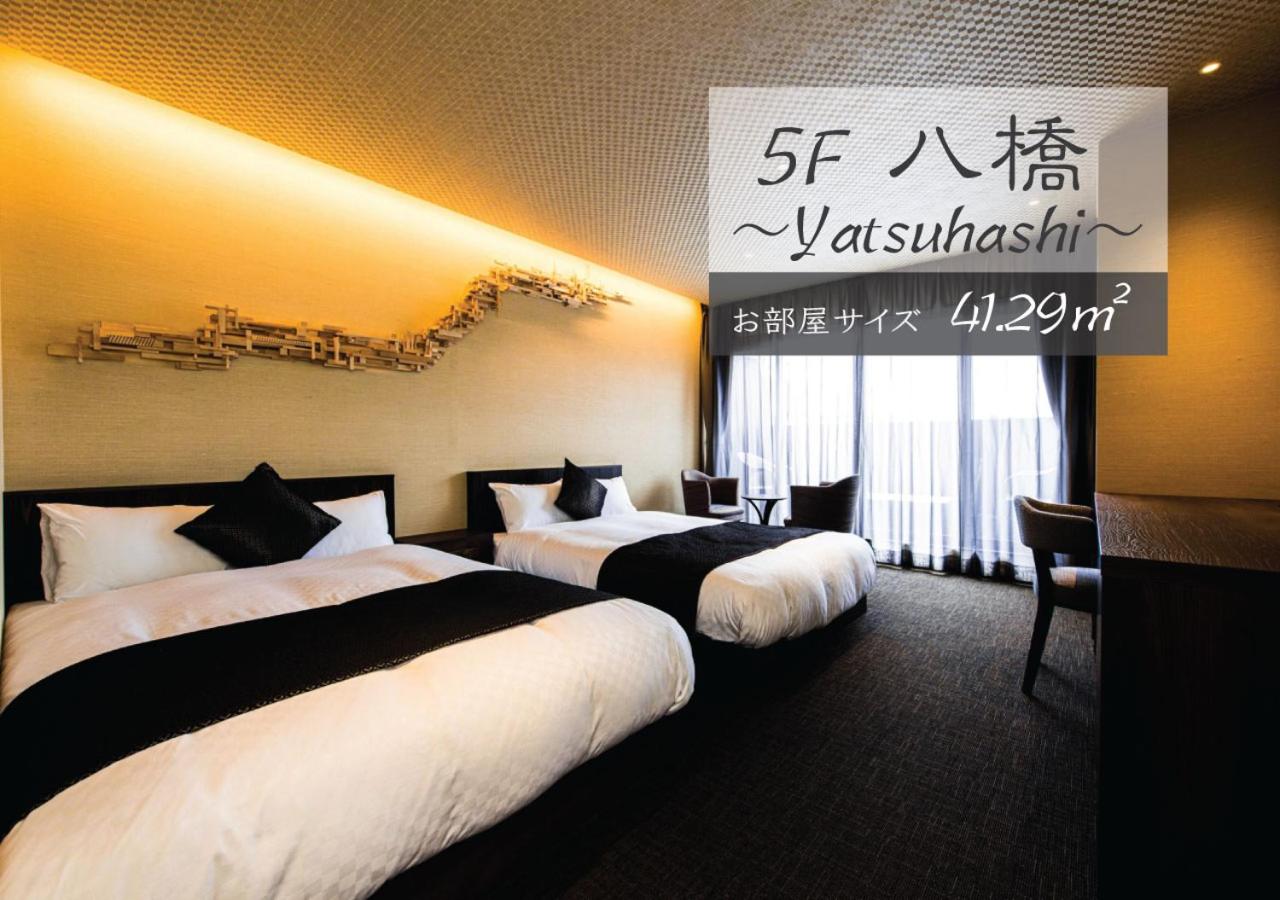 Quadruple Room with Balcony - Photo 1