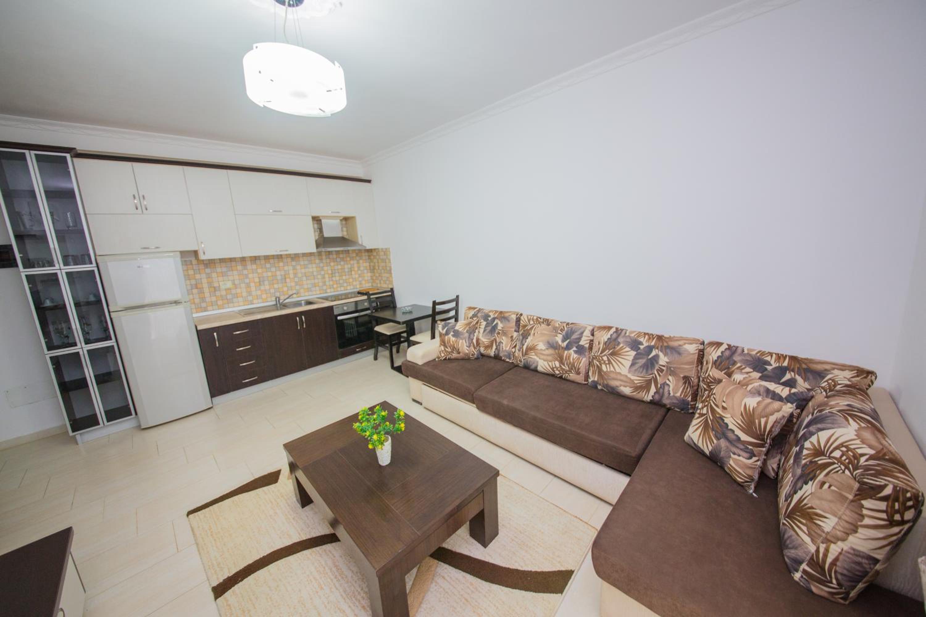 One-Bedroom Apartment with Balcony and Side Sea View