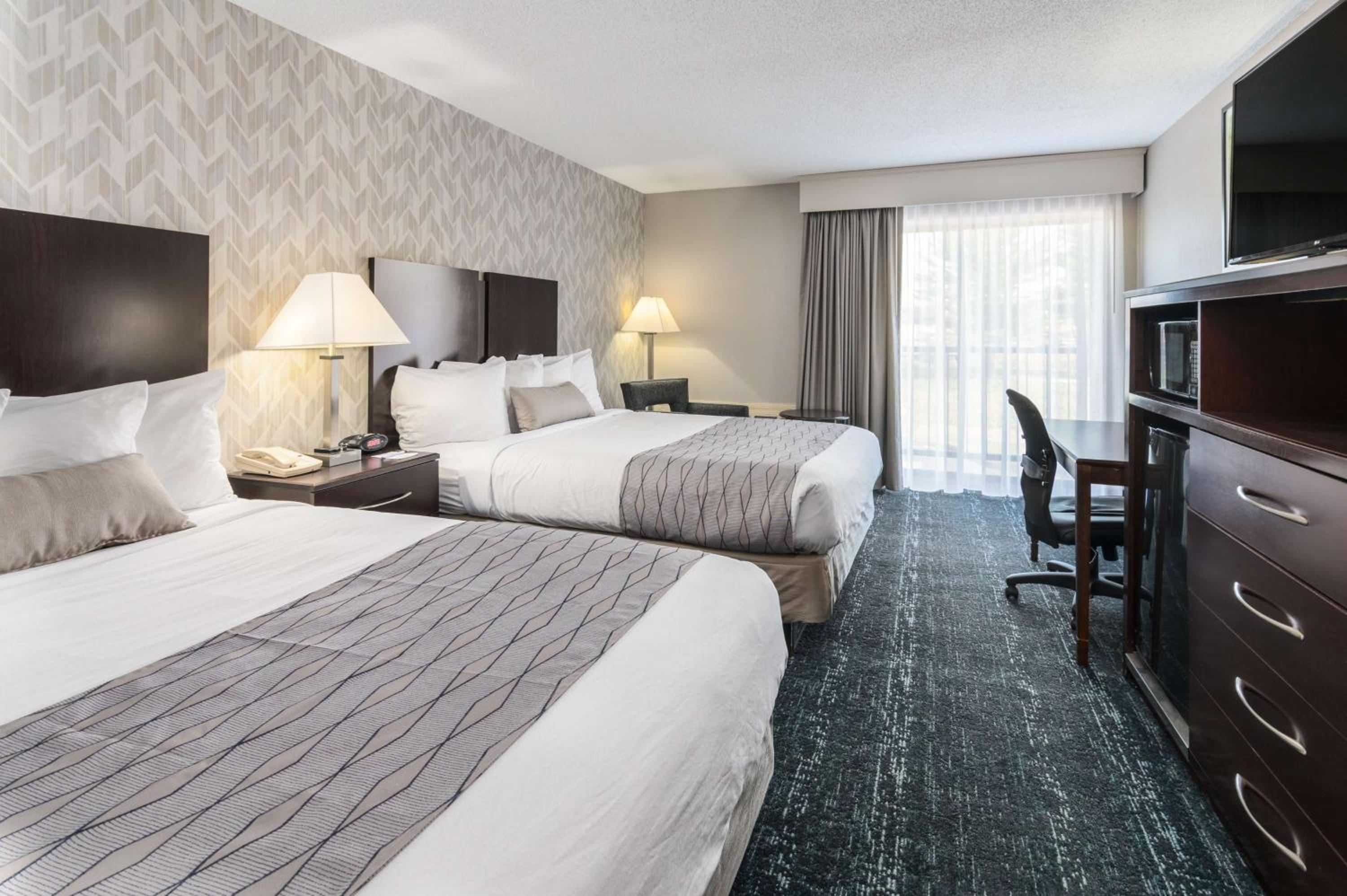 Queen Room with Two Queen Beds and Mobility Accessible Bathtub - Photo 3