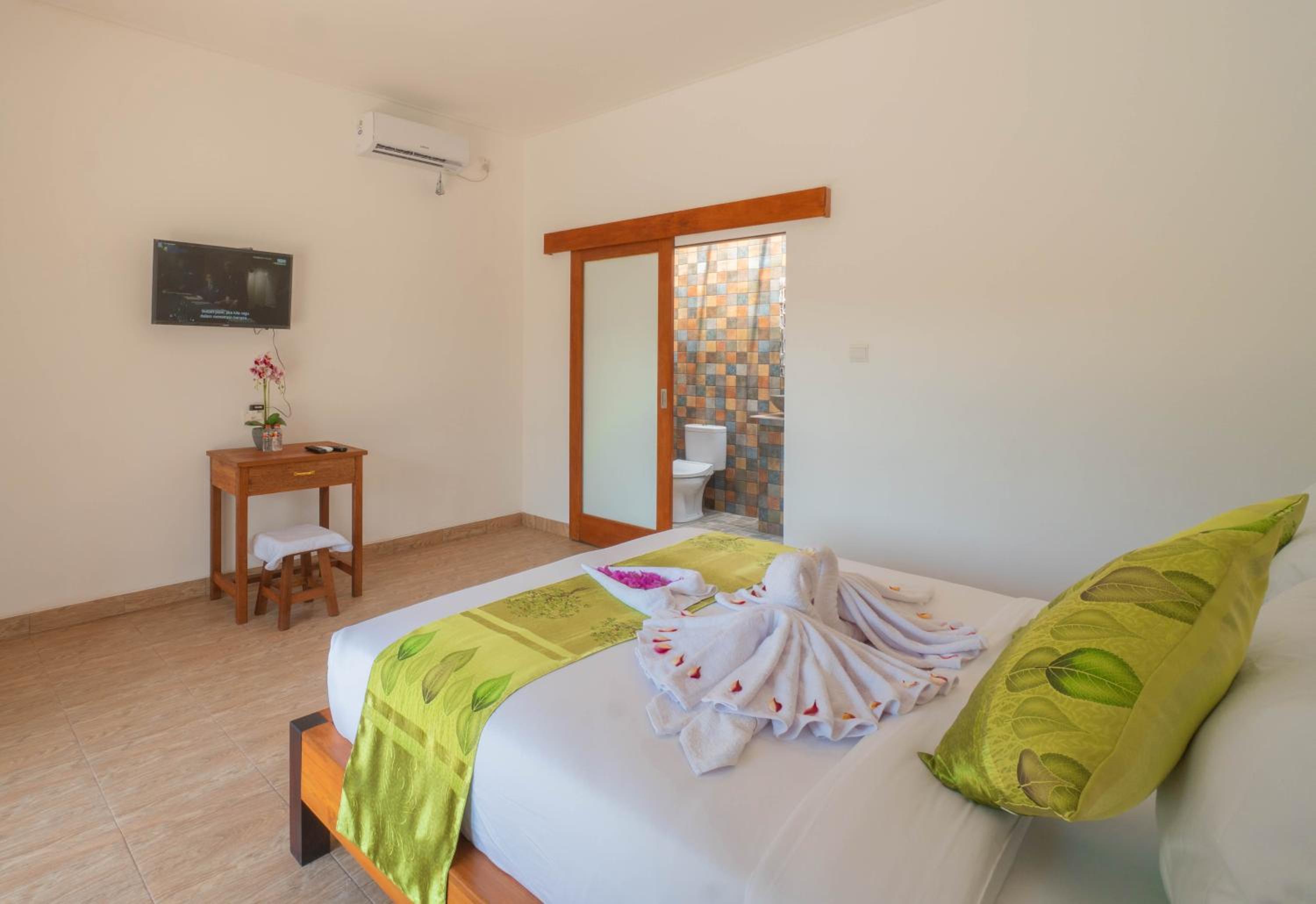 Deluxe Room - Photo 11