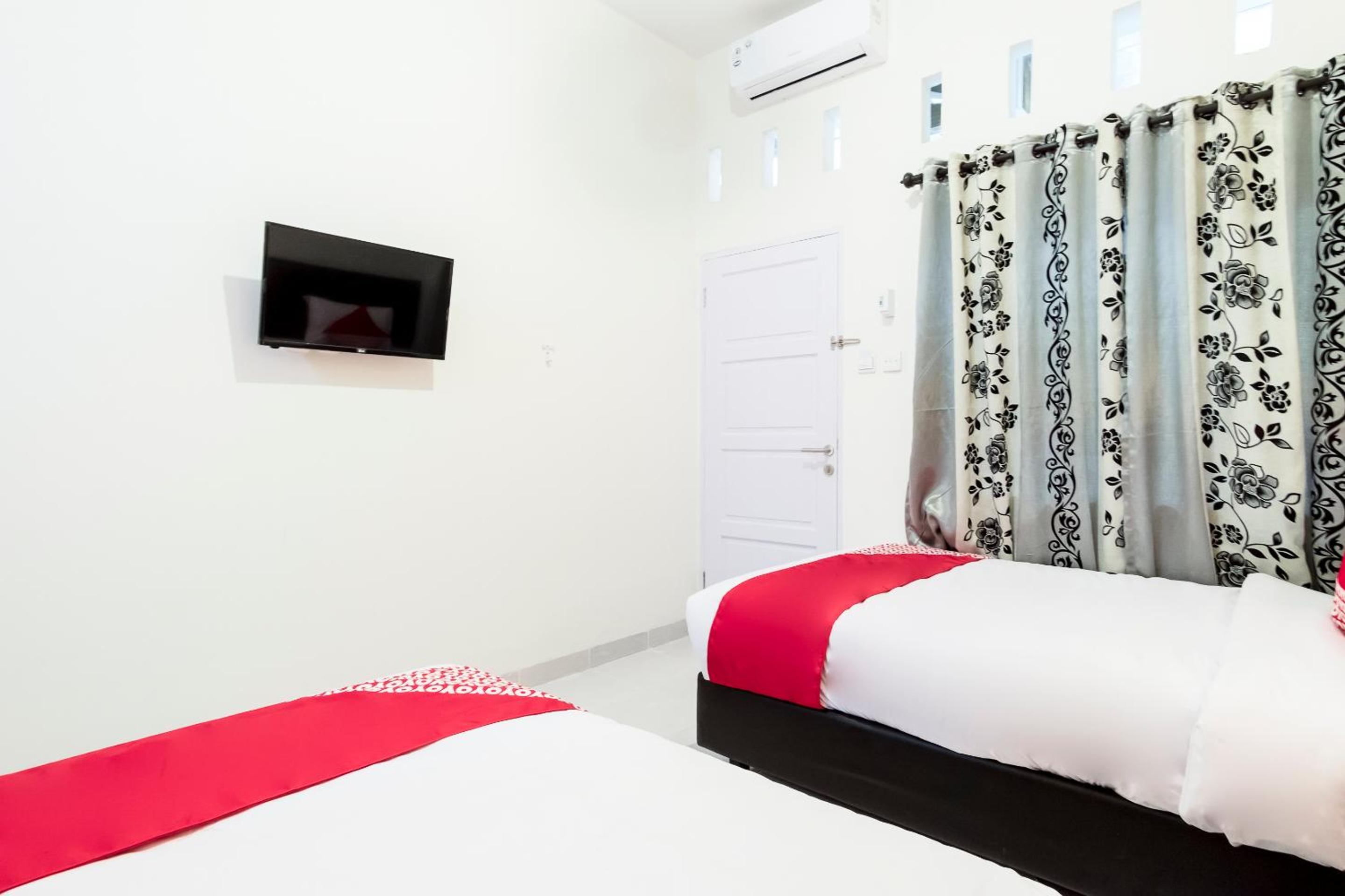 Standard Twin Room - Photo 11