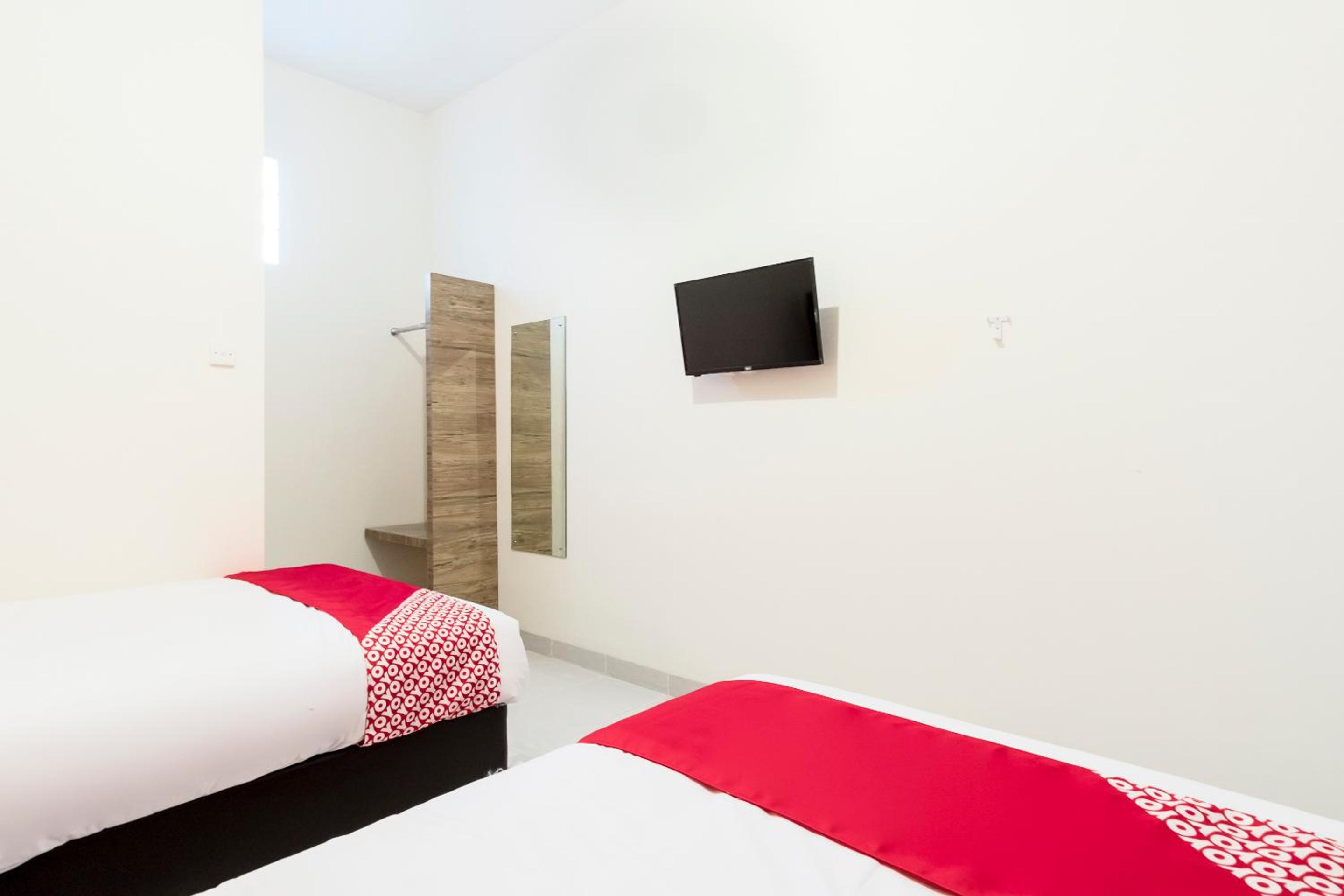 Standard Twin Room - Photo 10