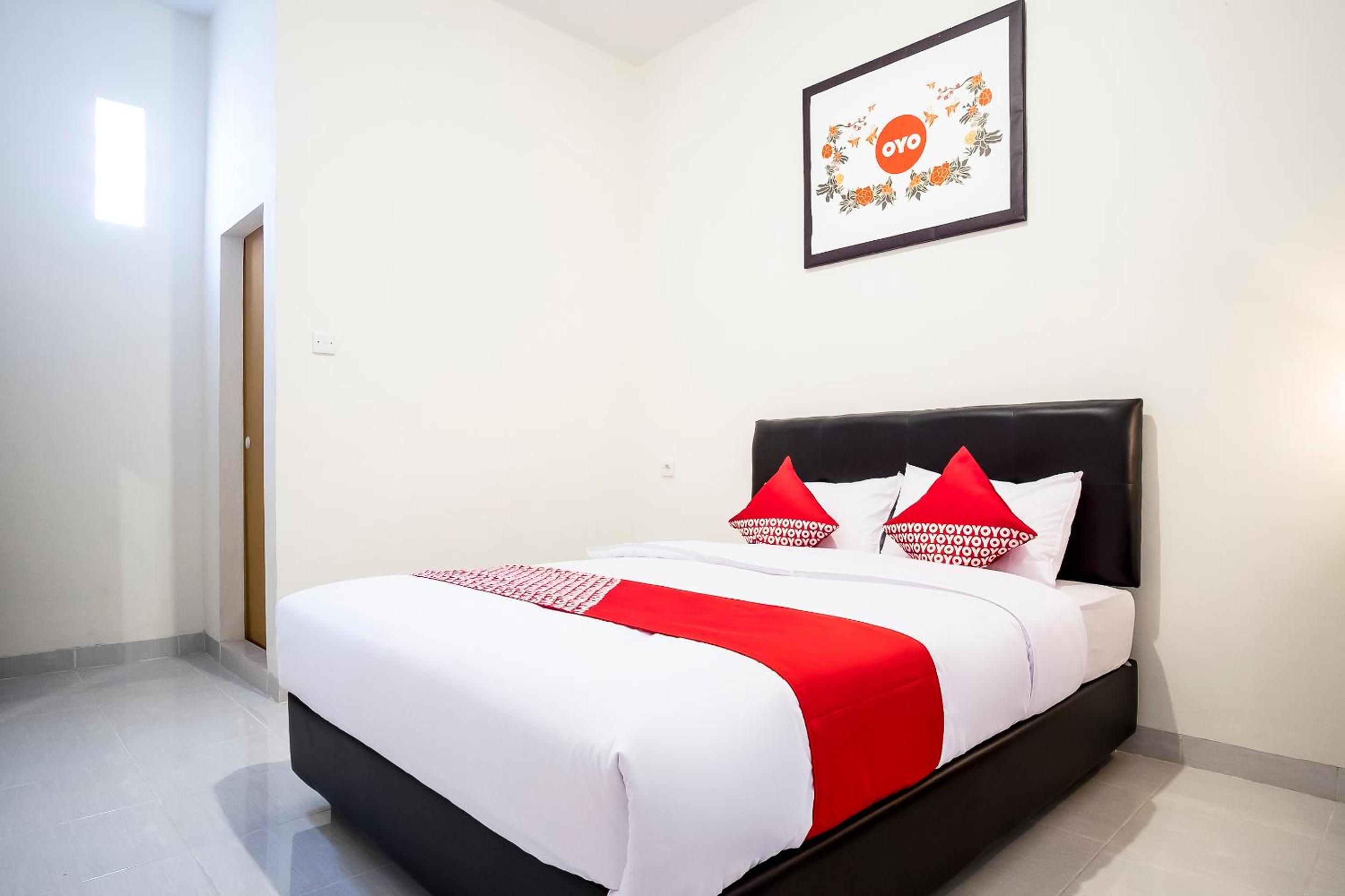 Deluxe Double Room - Photo 11