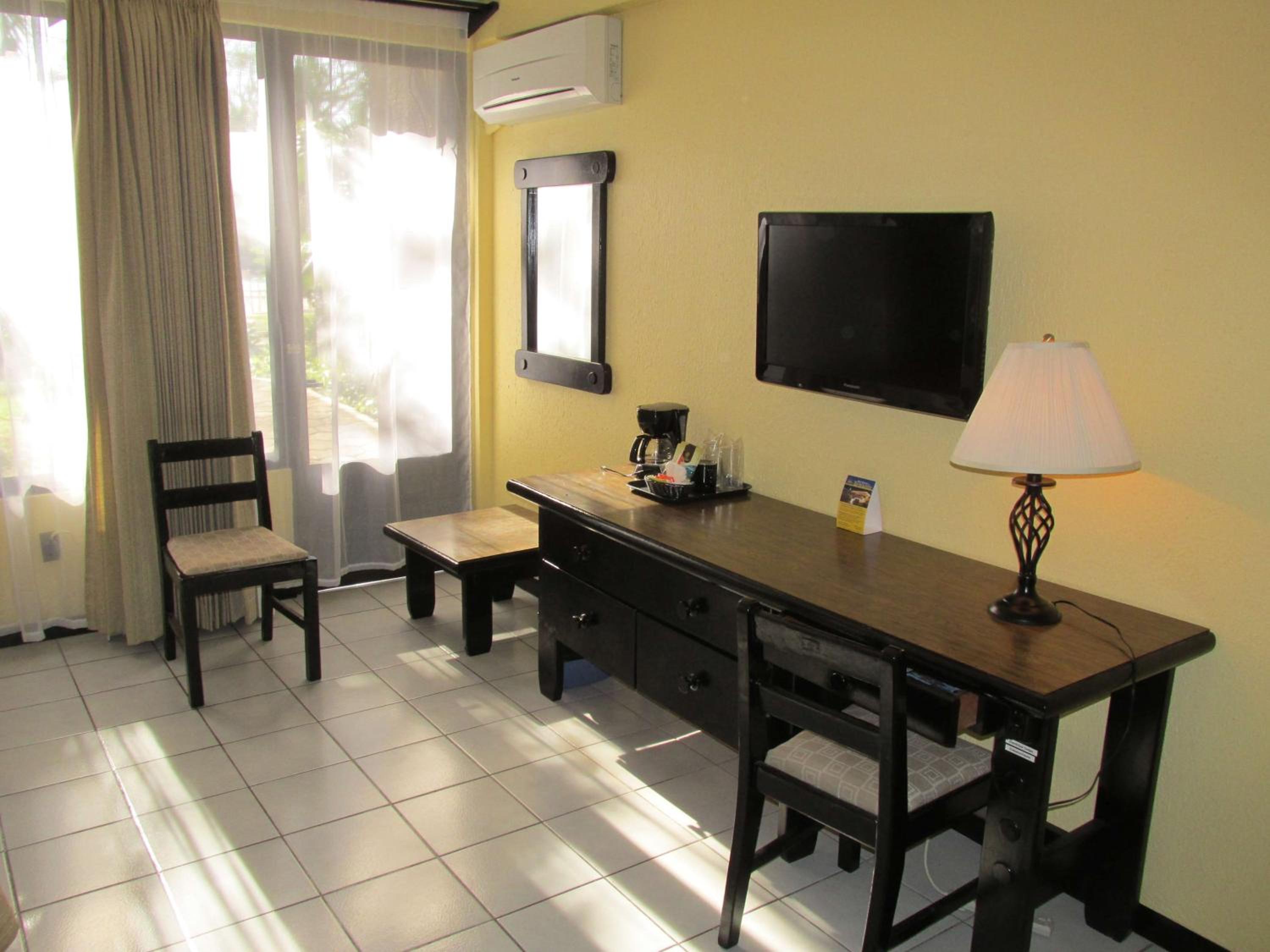 Standard Queen Room with Two Queen Beds photo 1