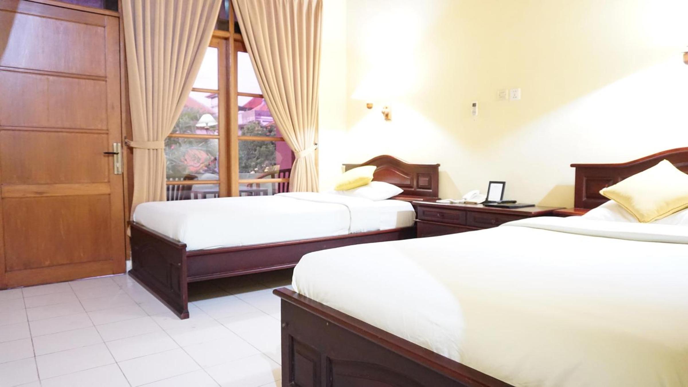 Deluxe Twin Room - Photo 10