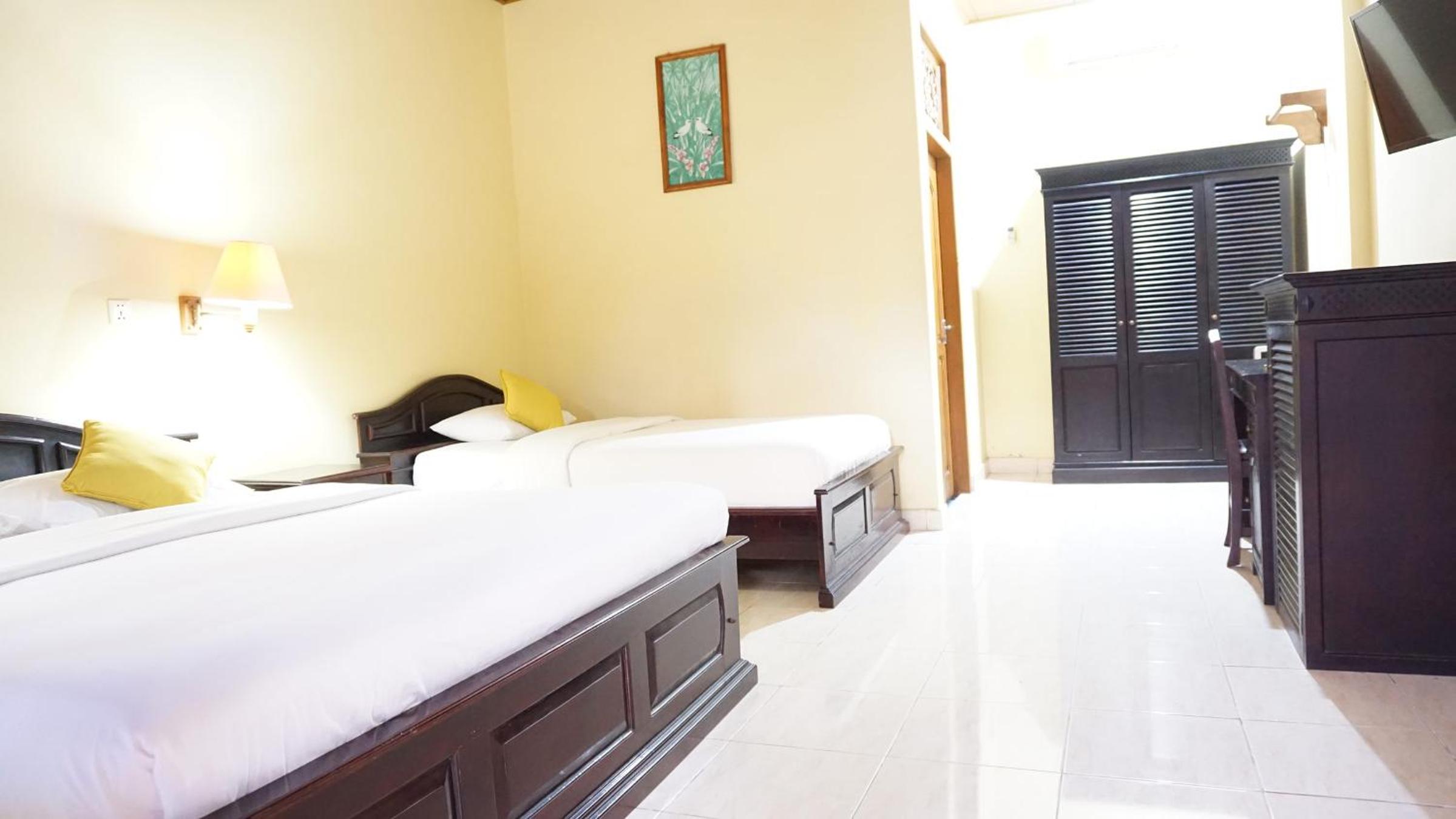 Deluxe Triple Room - Photo 6