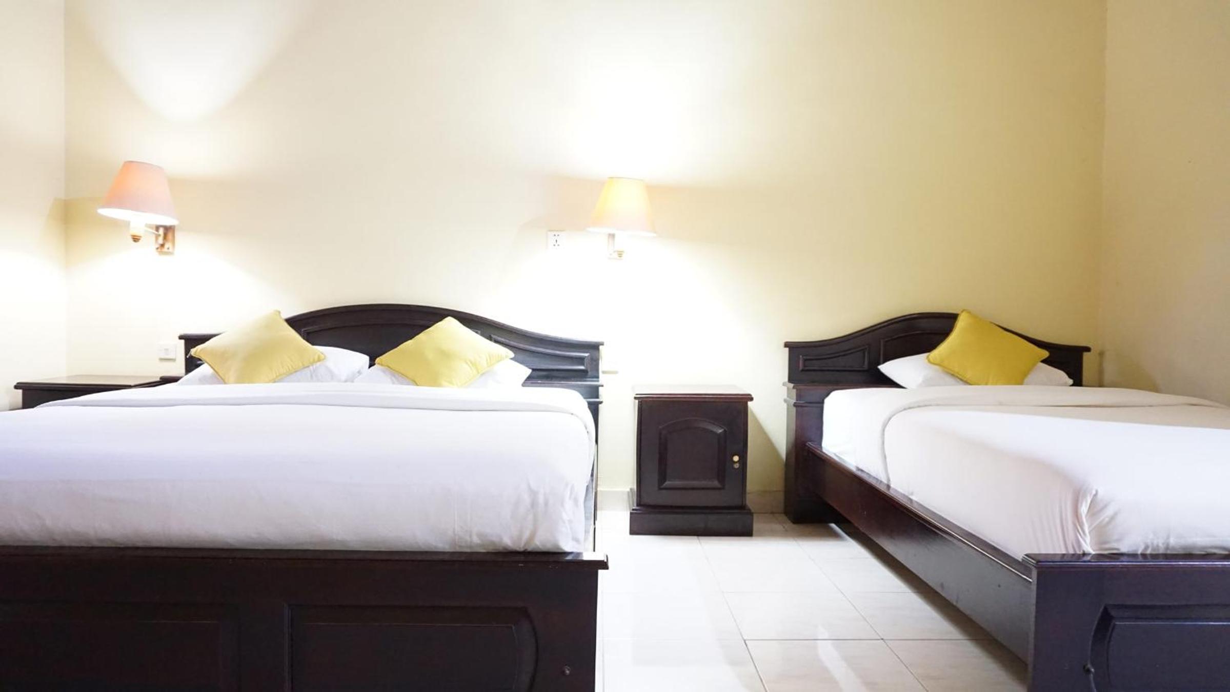 Deluxe Triple Room - Photo 14