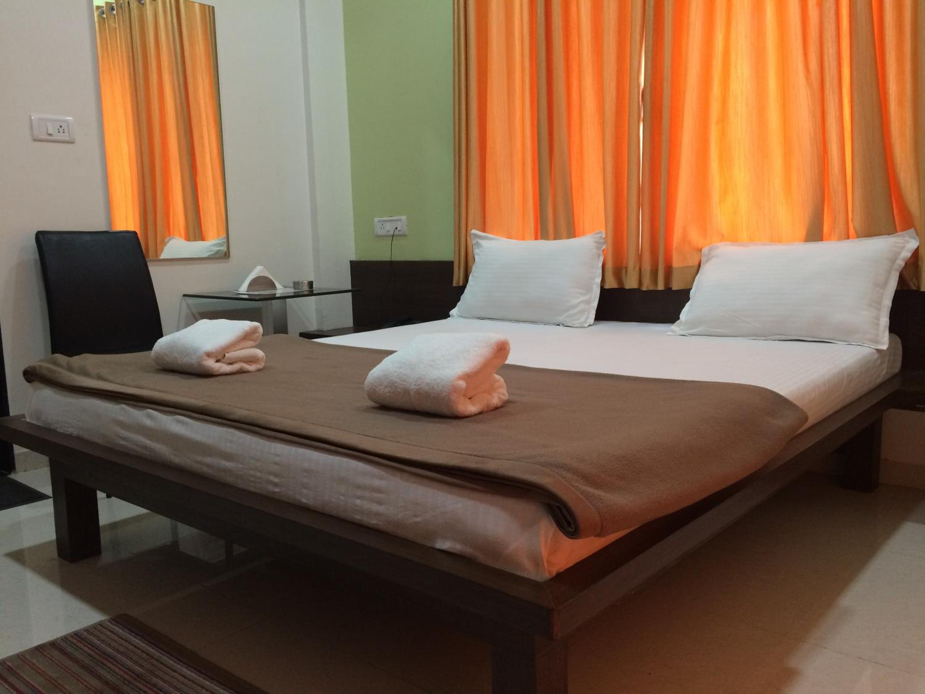 Deluxe Double Room (2 Adults + 1 Child) photo 2