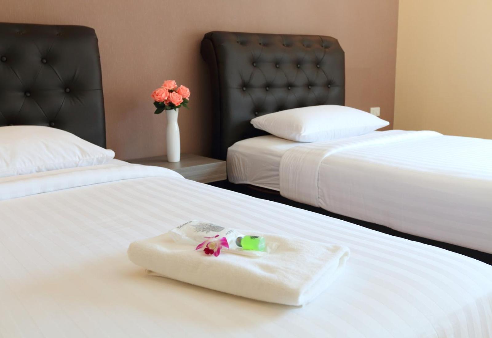 Standard Twin Room - Photo 4