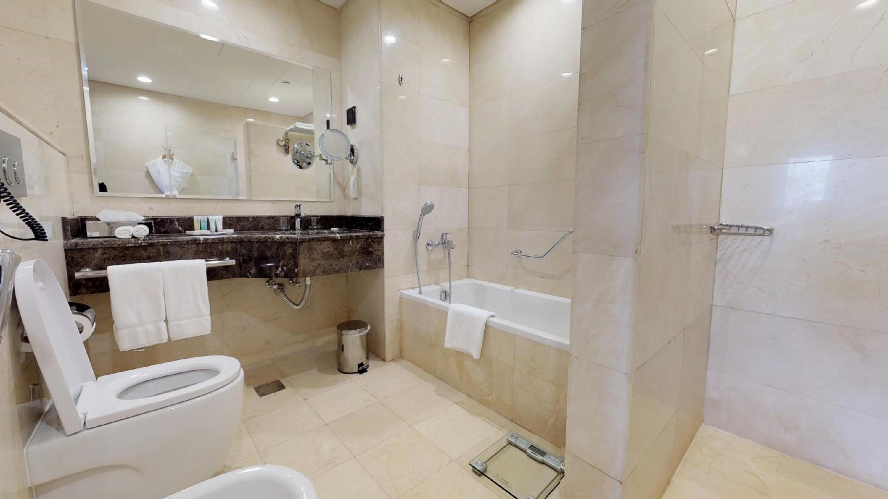 Three-Bedroom Apartment - Photo 12