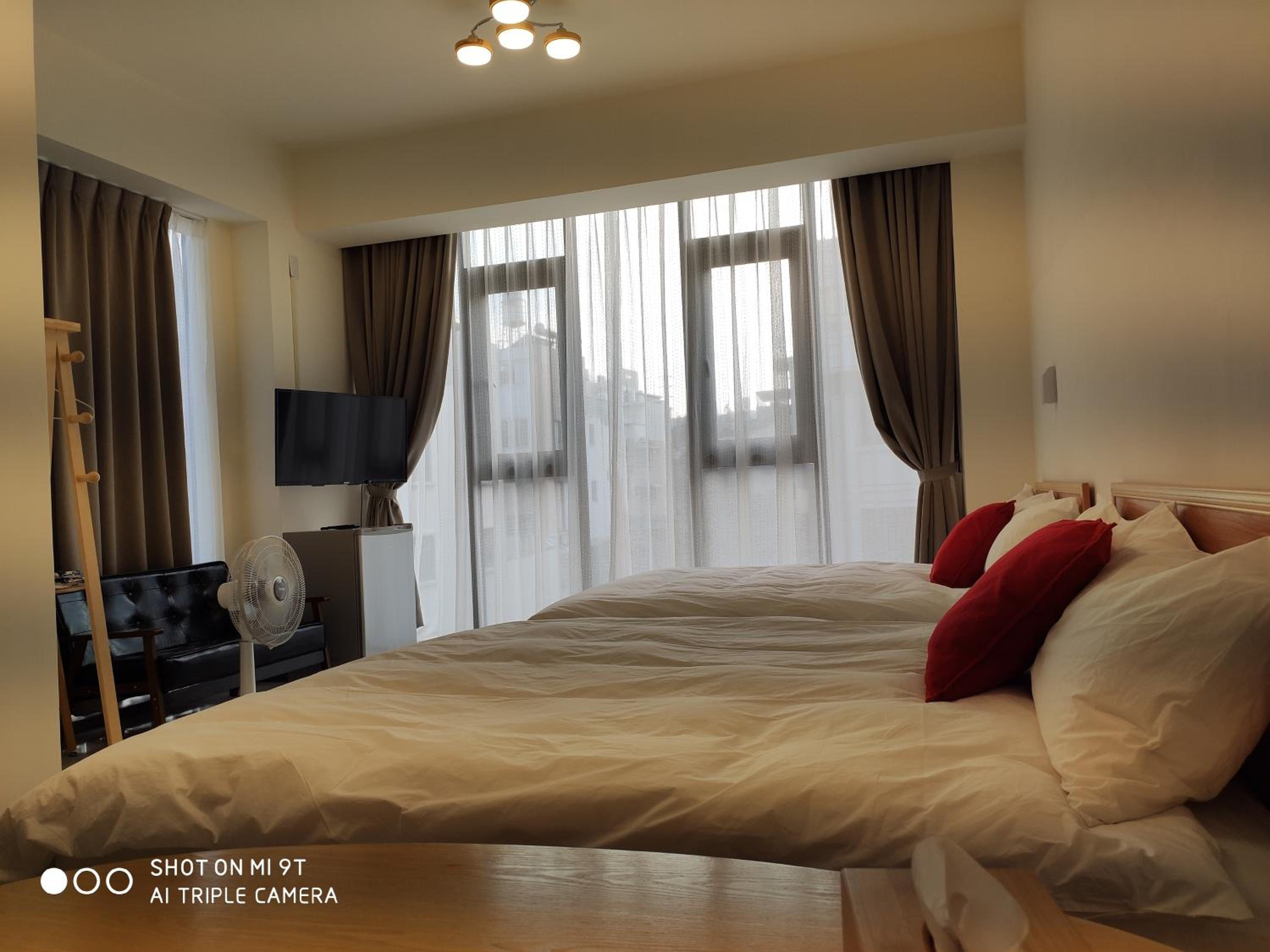Quadruple Room with Private Bathroom - Photo 1