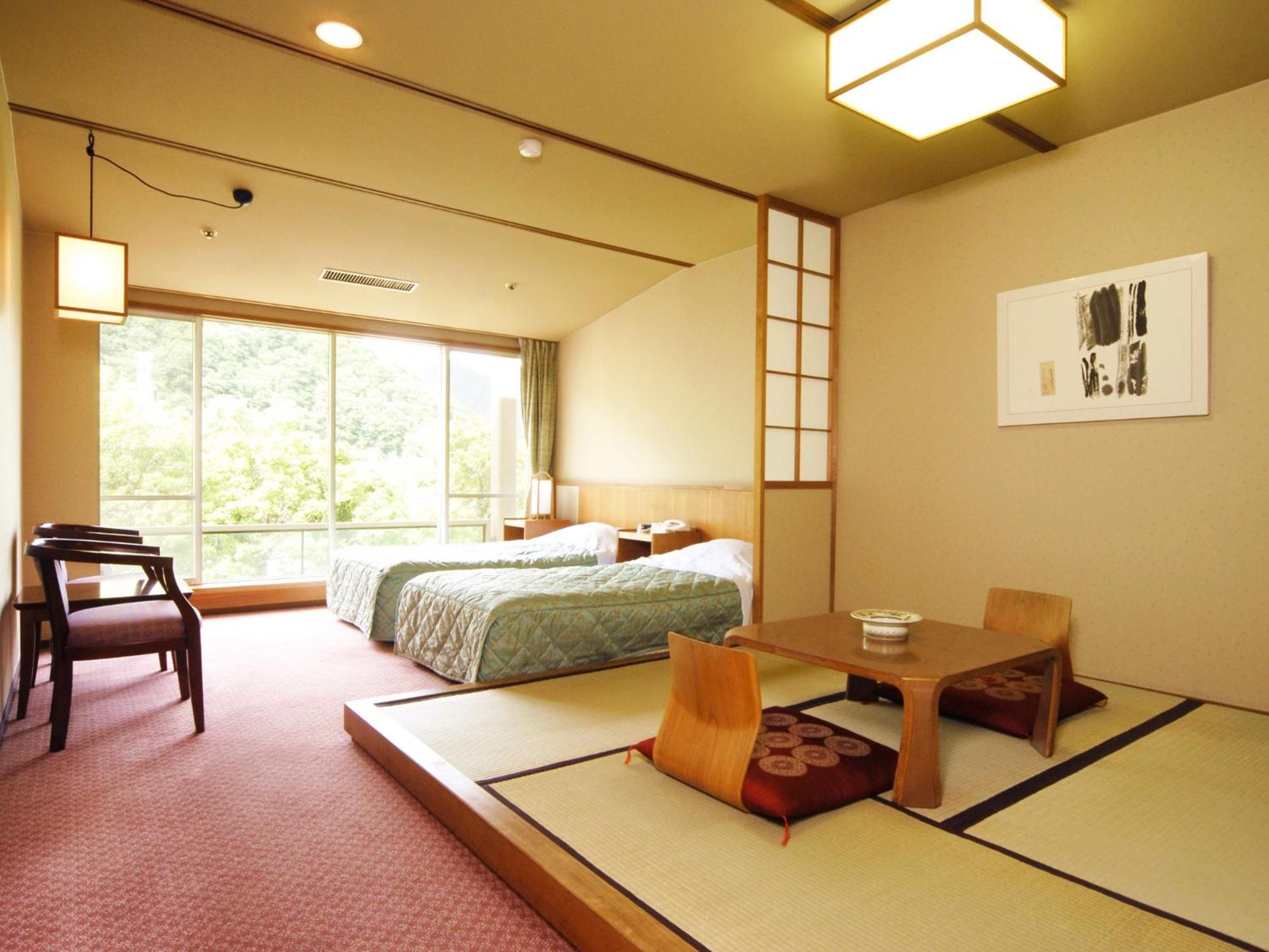Twin Room with Tatami Area on Top Floor - Non-Smoking photo 1