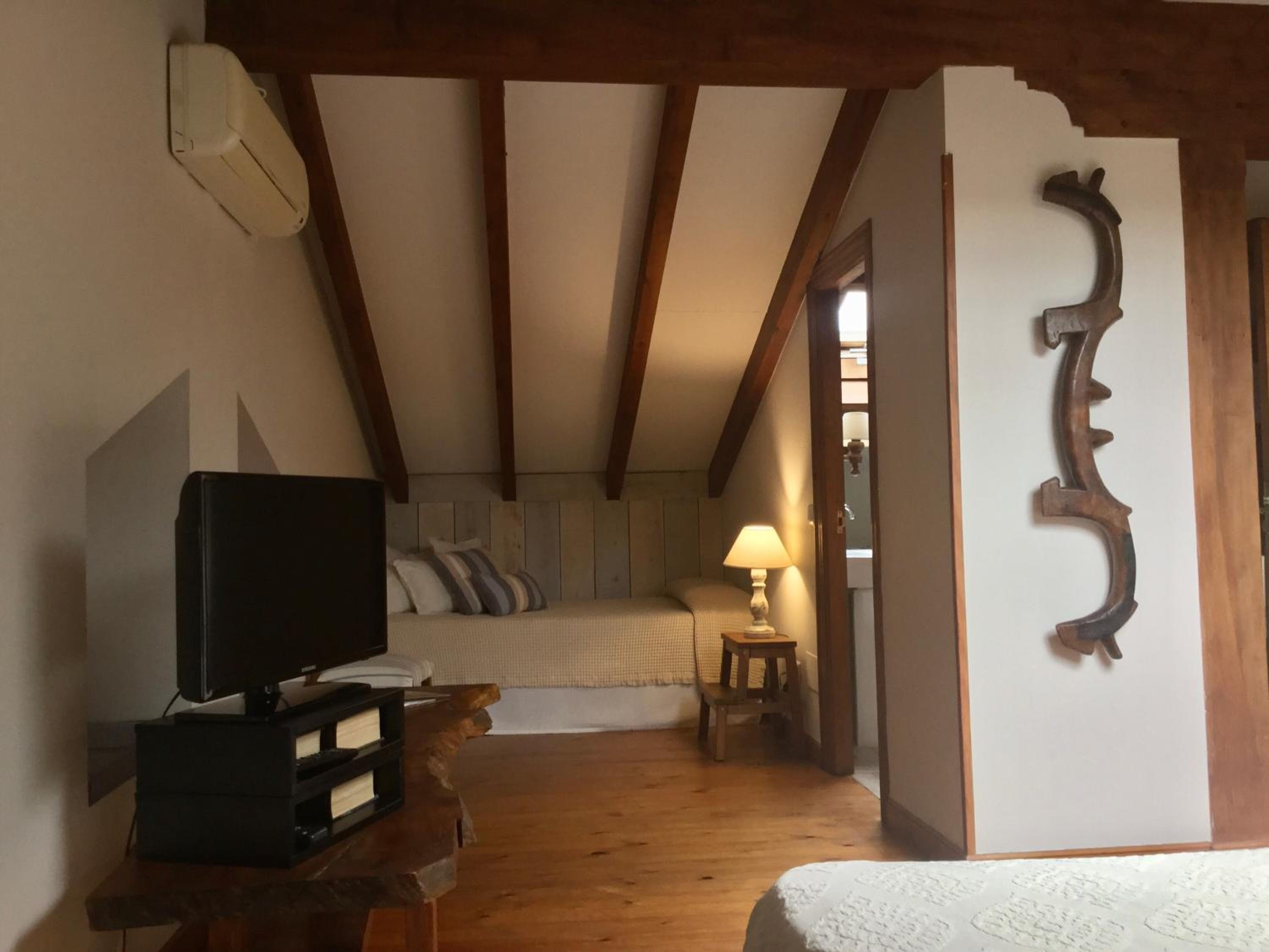 Habitación triple con baño